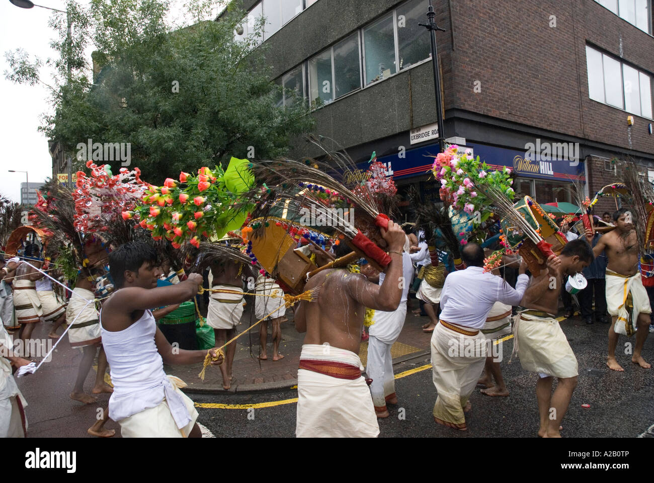 Young men from Sri Kanaga Thurkai Amman Temple performing Kavadi  the annual Chariot Festival West Ealing London Stock Photo