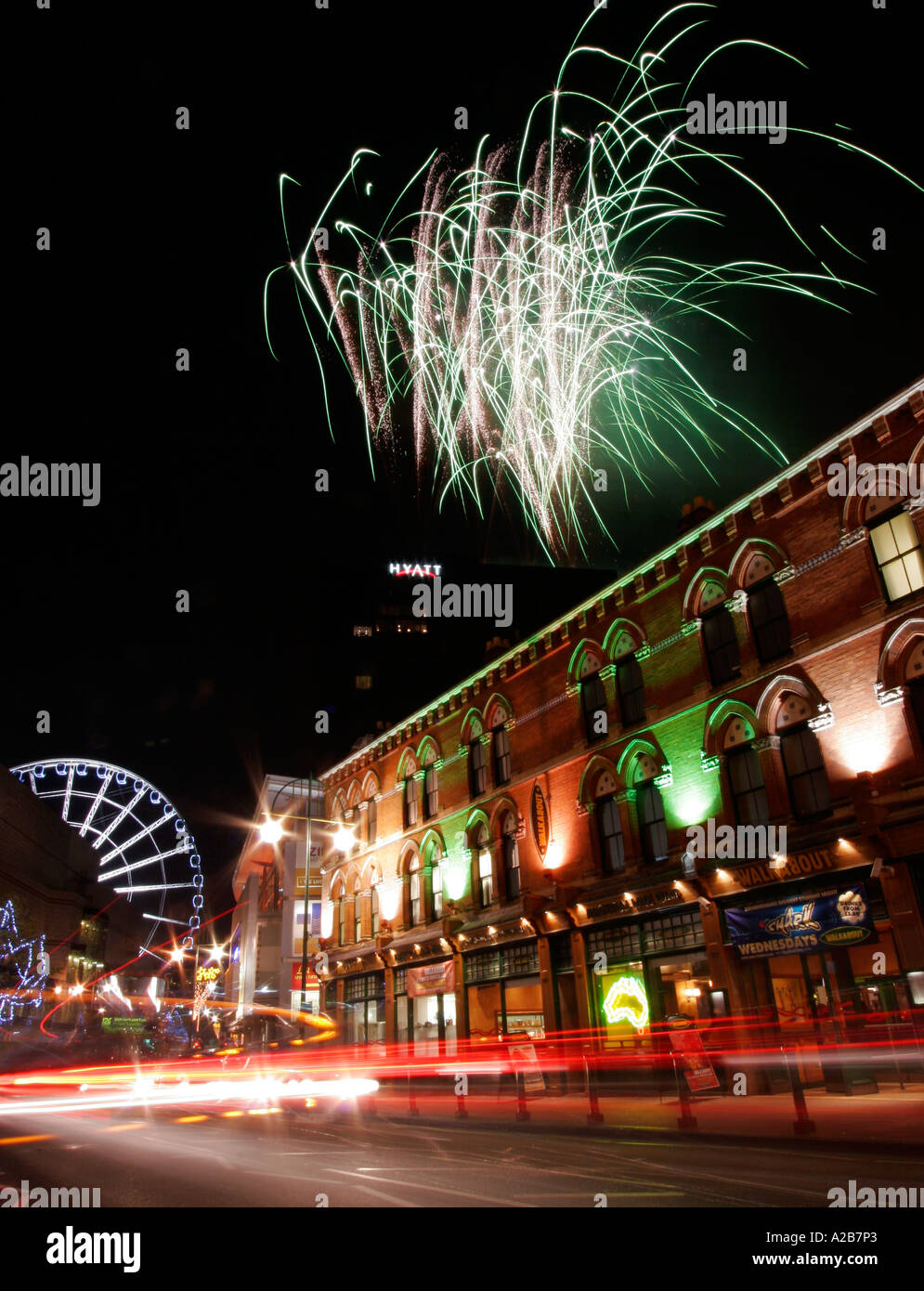 Broad Street in Birmingham England UK with fireworks and big wheel
