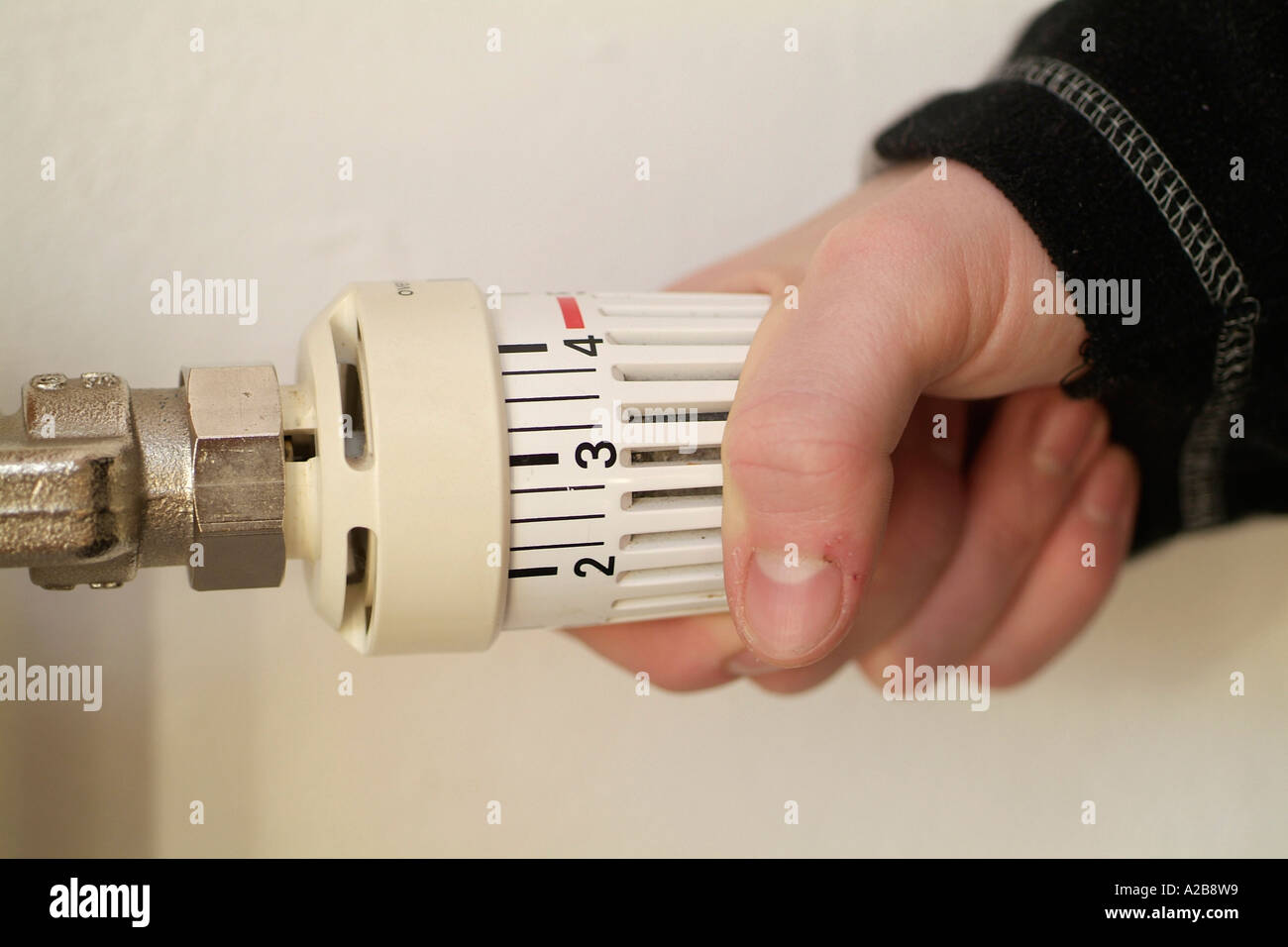 Thermostat at heating elements Stock Photo Alamy