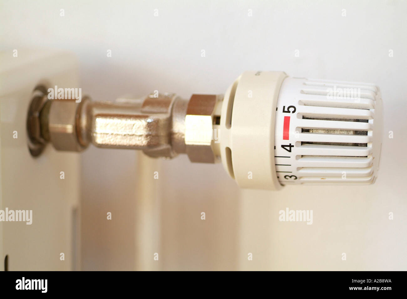 Thermostat at heating elements Stock Photo Alamy