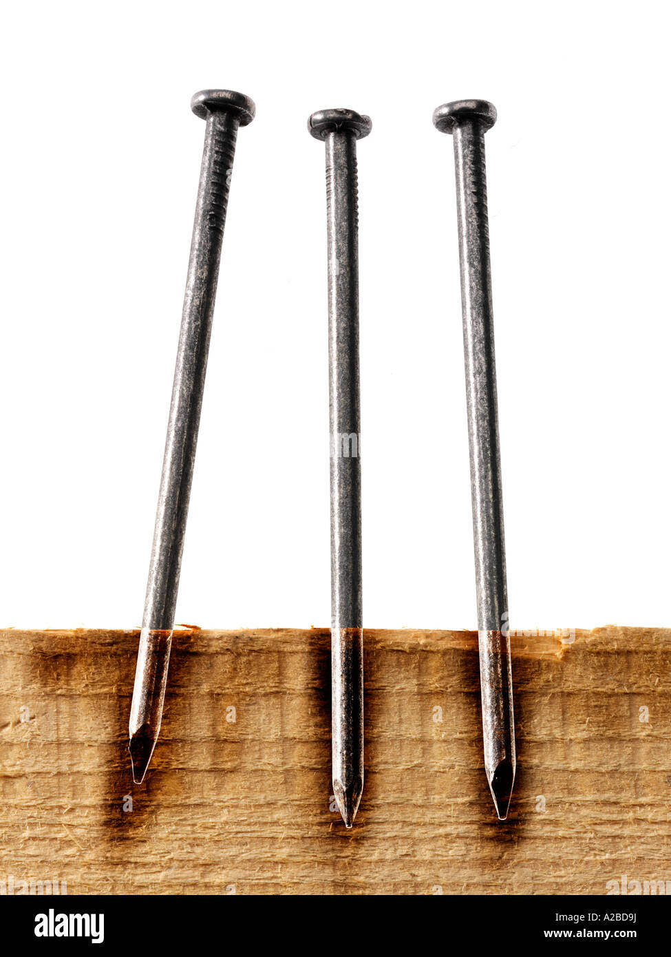 Nails in wood Stock Photo Alamy
