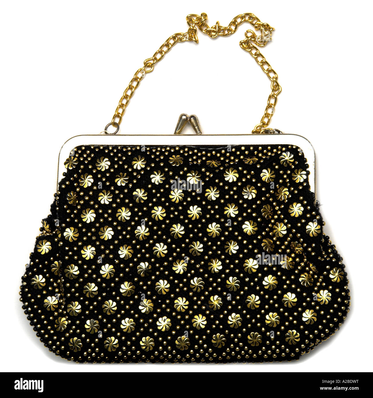 A black and gold coloured handbag Stock Photo