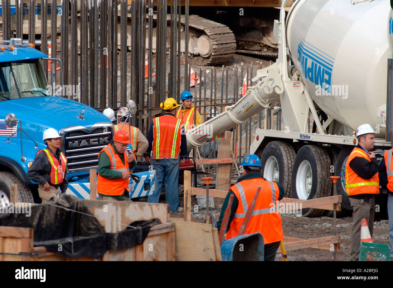 Workers pour concrete in Ground Zero for the Freedom Tower foundation