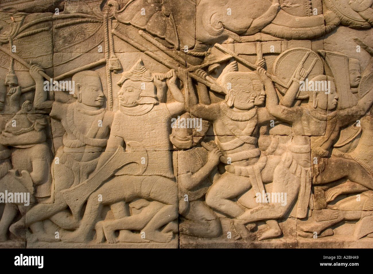 Cambodia Siem Reap Angkor Thom The Bayon bas relief panel showing 1177 Wars when Khmers were defeated Angkor pillaged Stock Photo