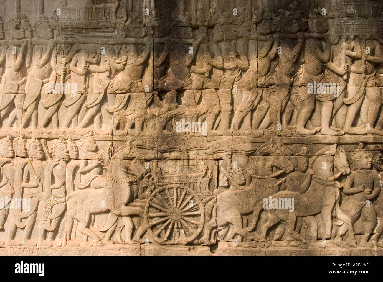 Cambodia Siem Reap Angkor Thom The Bayon bas relief panel showing 1177 Wars carriage pulled by horses Stock Photo