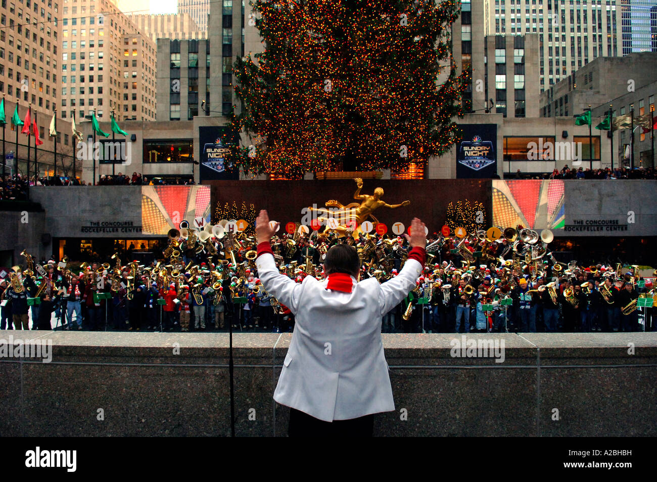 Bass and tenor tuba players gather on the The Rink at Rockefeller