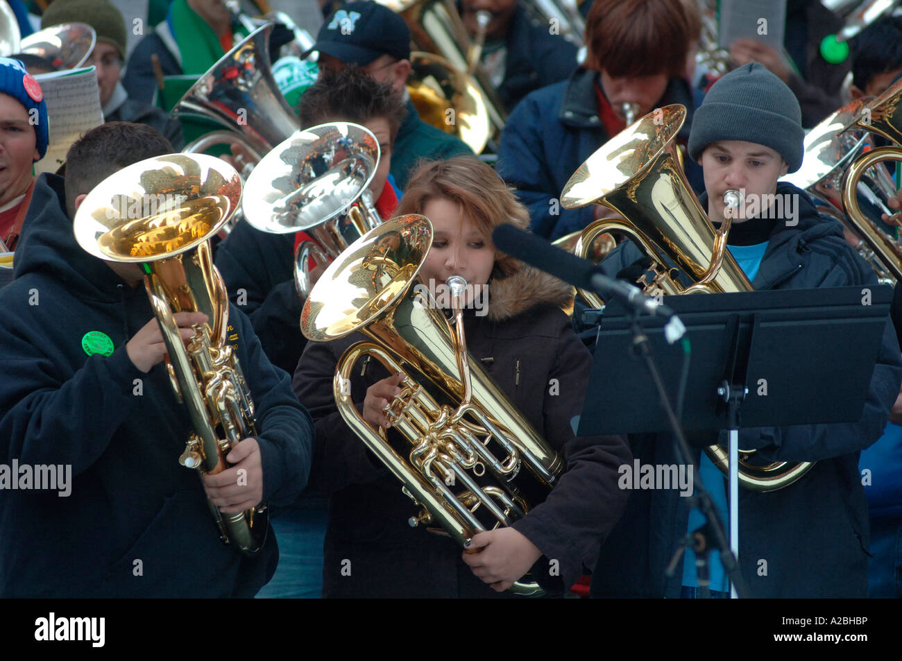 Bass and tenor tuba players gather on the The Rink at Rockefeller