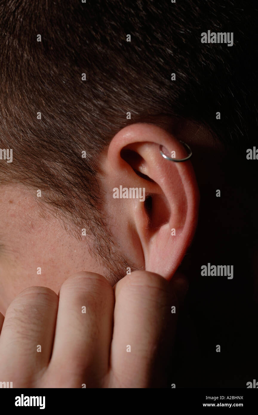 Ear pull hires stock photography and images Alamy