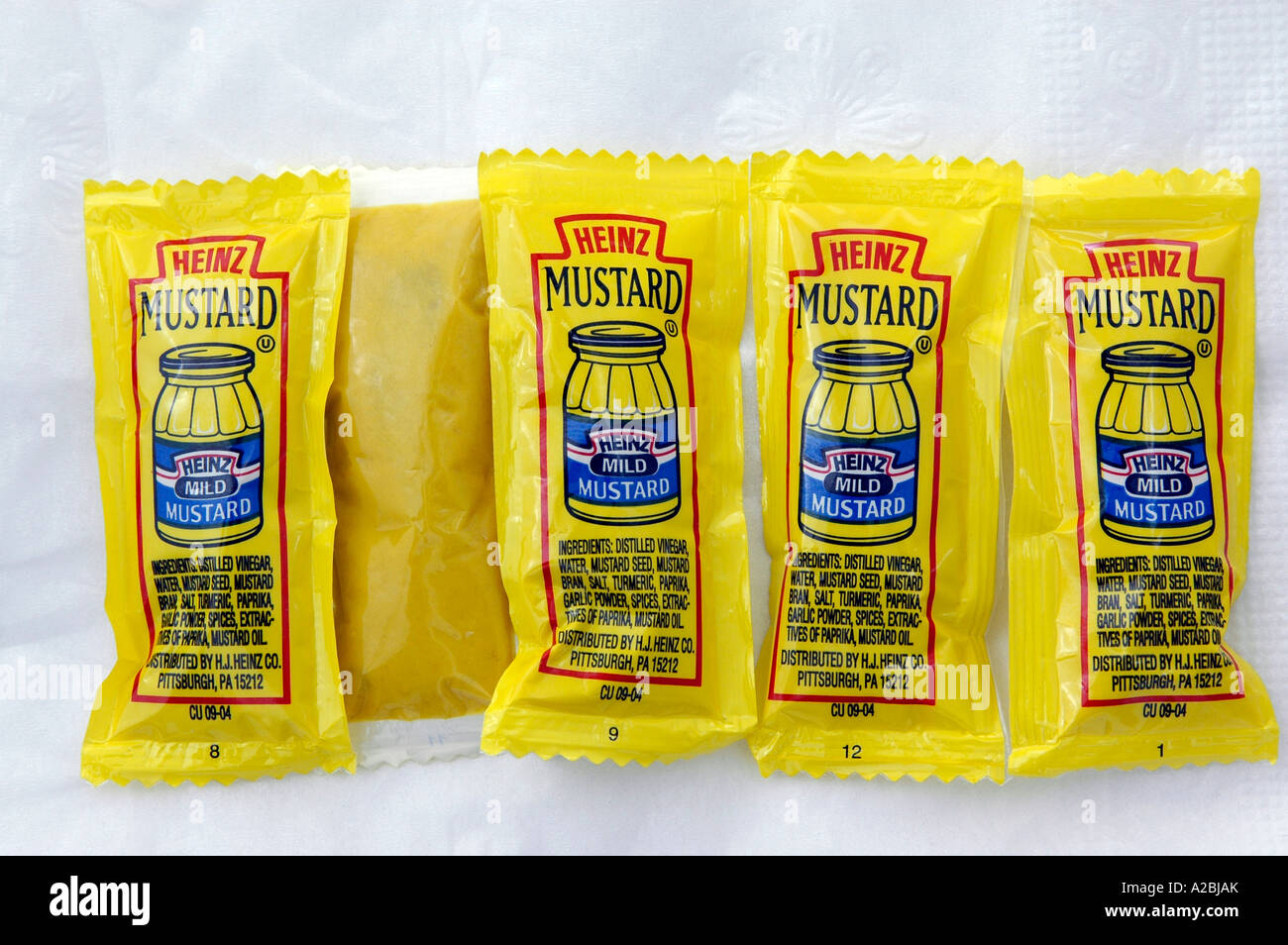 Individual packets of H J Heinz mustard Stock Photo Alamy