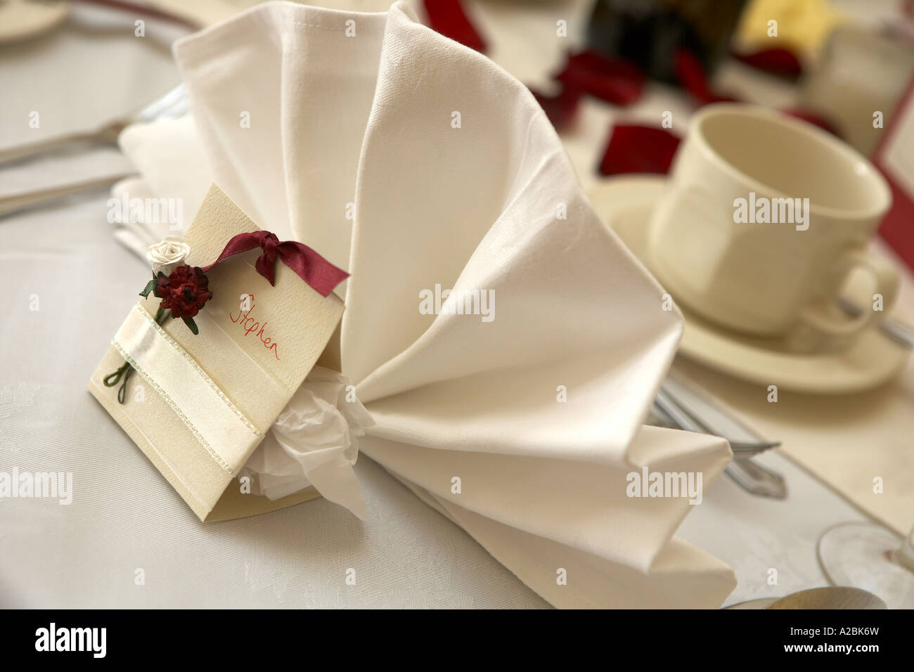 Folded Napkin And Name On Card On A Table Set For A Wedding