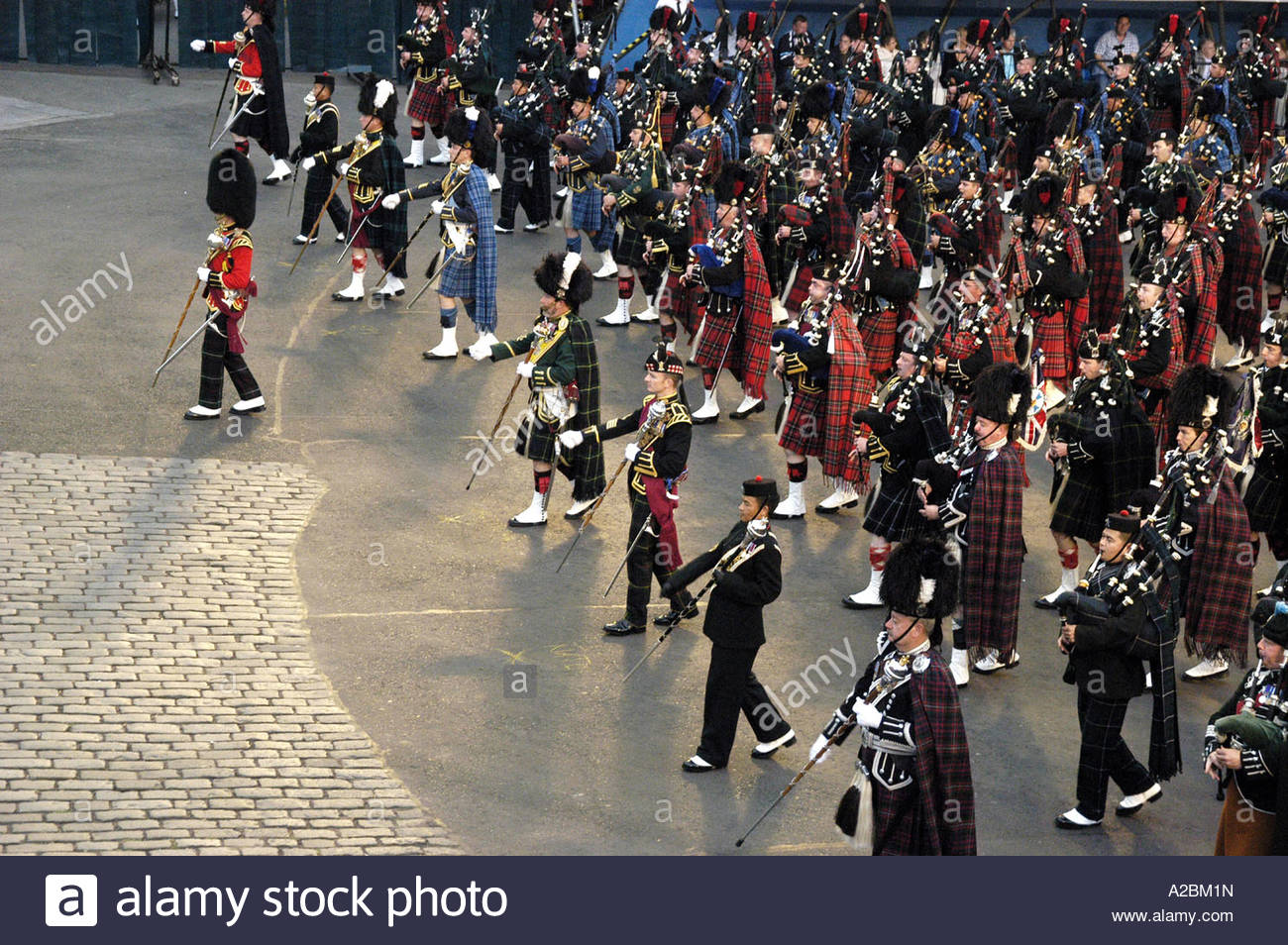 Massed pipes and drums bands marching at the Edinburgh Tattoo ...