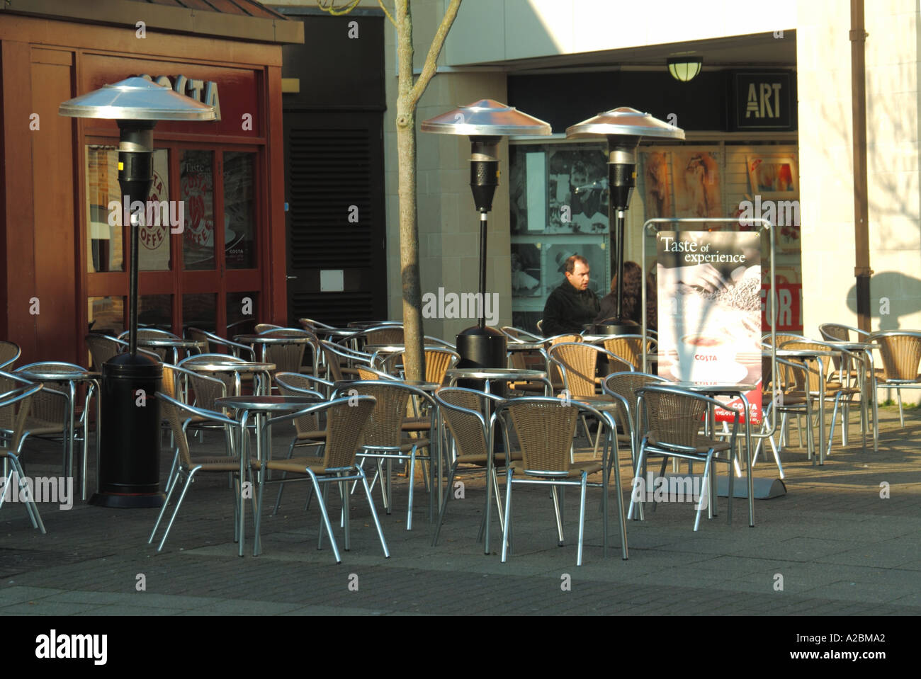 Town centre winter view of outdoor Costa coffee bar equipped with large