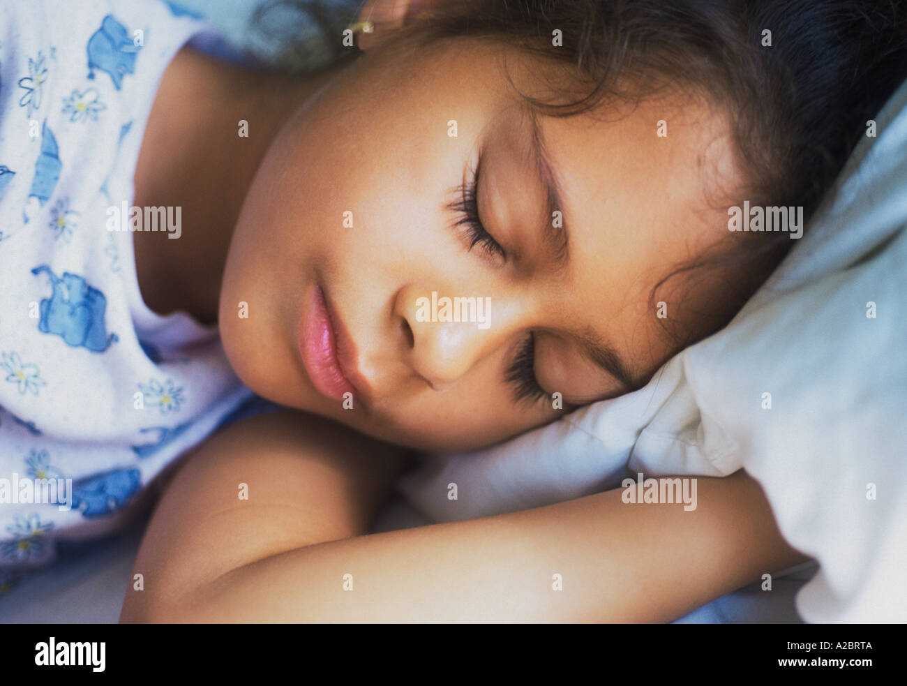 At home Nine Ten Eleven Year Old Child Sleeping in Bed Childhood Peaceful Serene One Girl Only