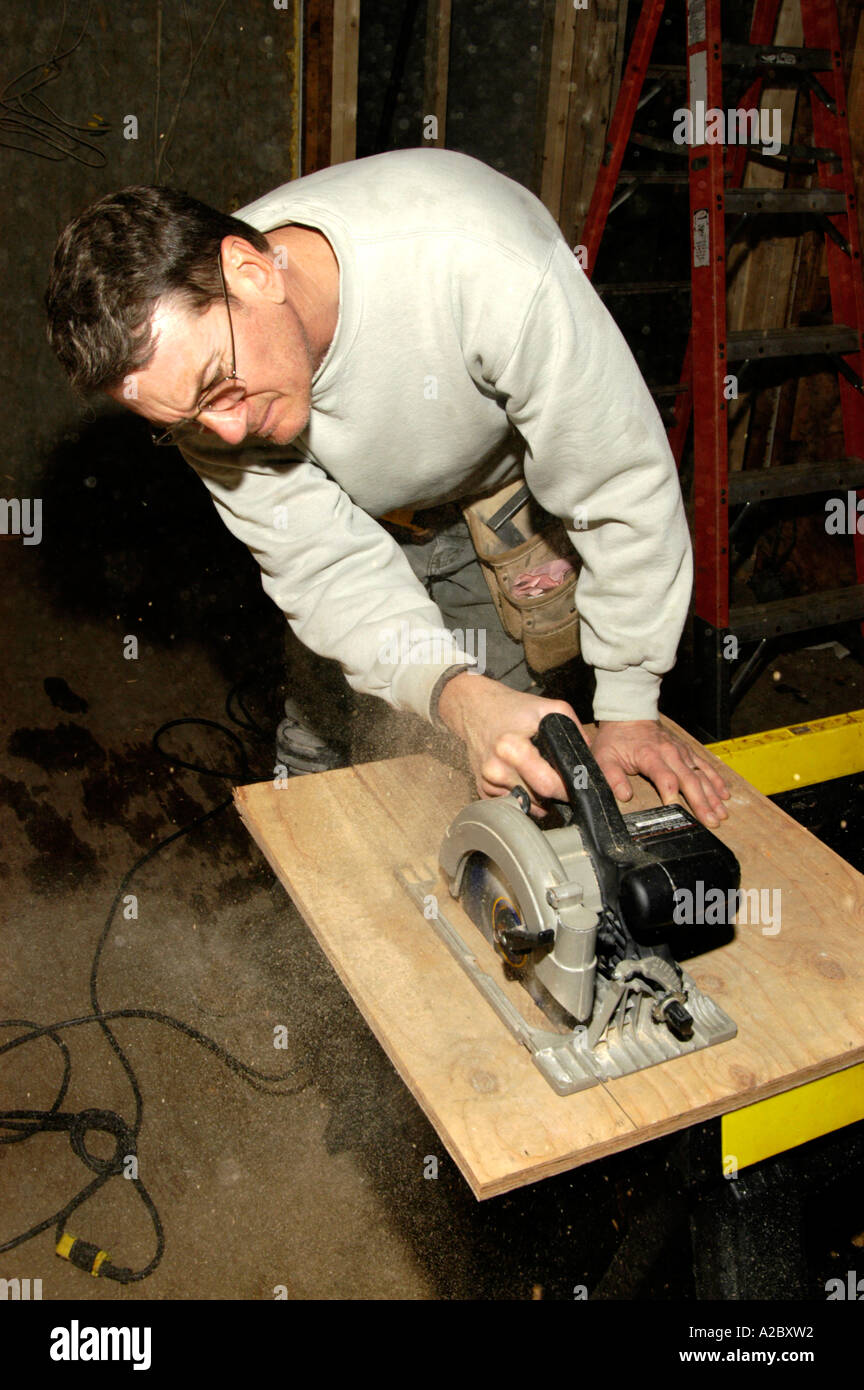 Carpenter using to cut plywood Stock Photo Alamy