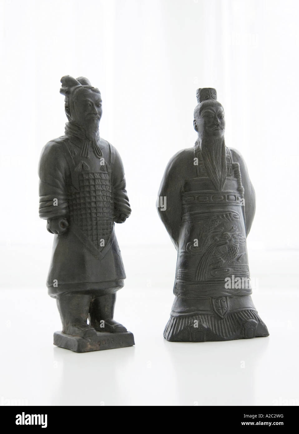 two Chinese carved wooden figures about 12' / 300mm in height Stock Photo