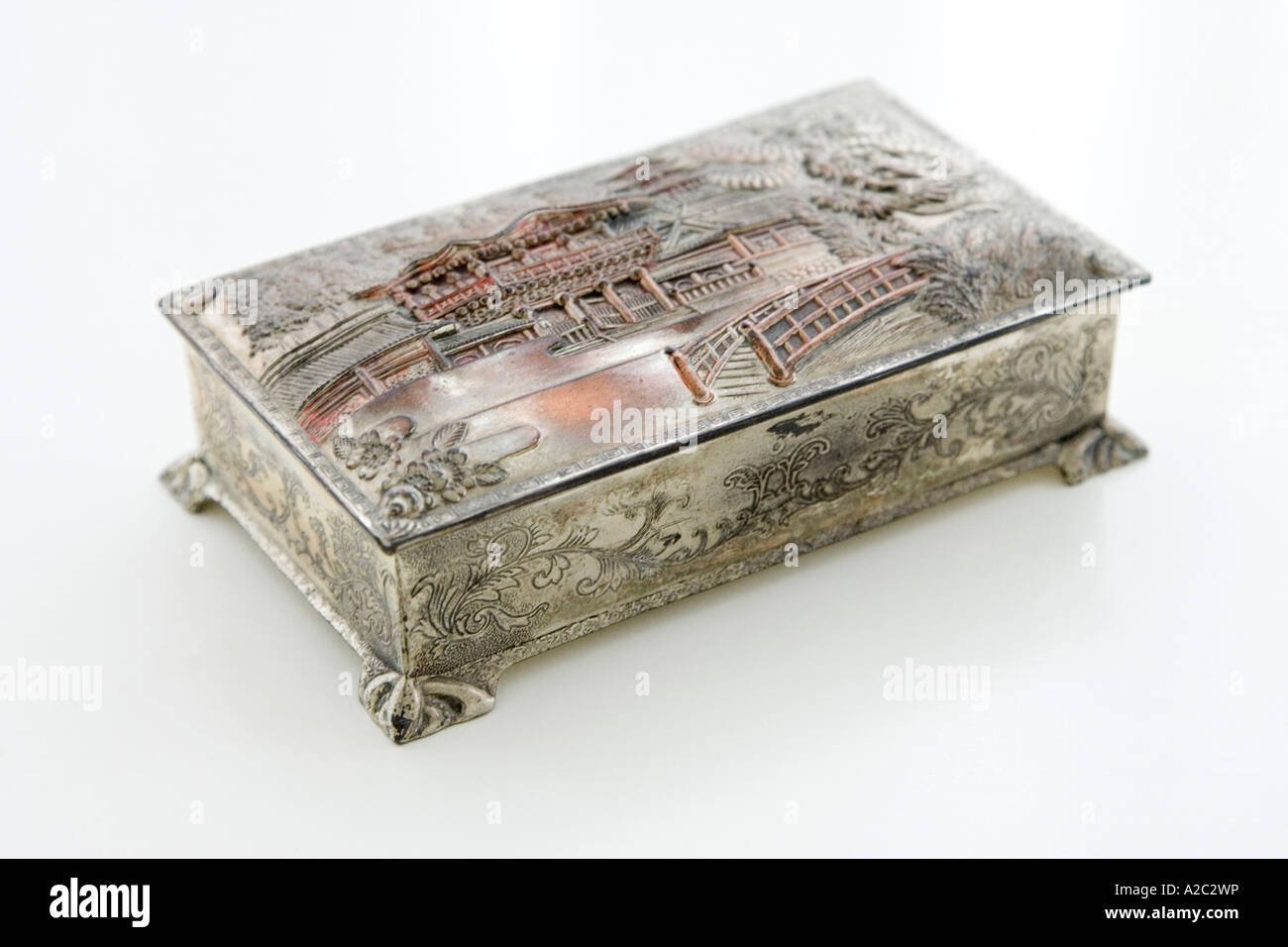 silver plated trinket box with carvings of ancient outdoor scene Stock Photo