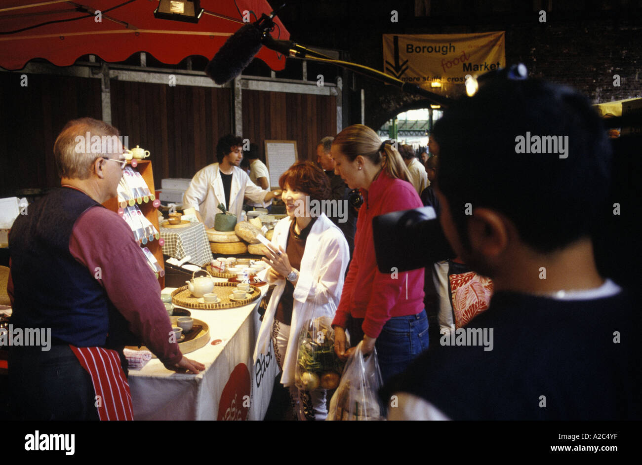 Harumi Kurihara, celebrity chef and Japanese television film  crew at Borough Market London 2005 Stock Photo