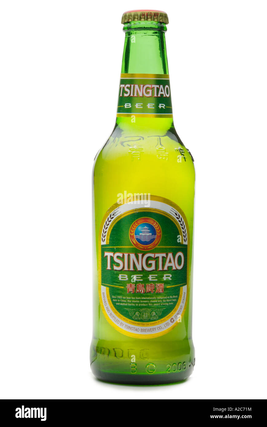 TSINGTAO BEER imported China Chinese orient oriental far east Asia crown top green glass bottle alcohol barley booze Beer Stock Photo