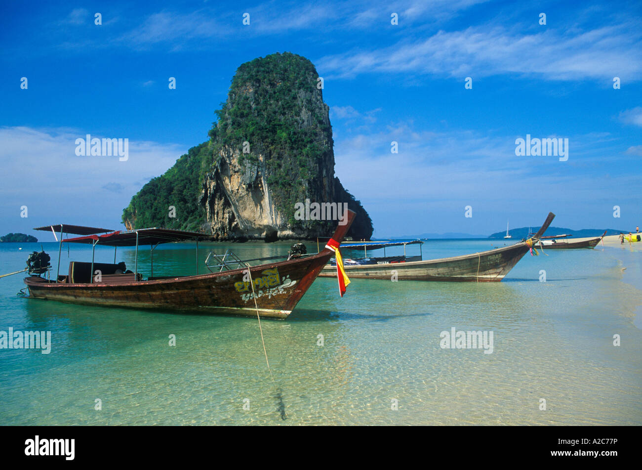 longtail boats at Phranang Cave Beach near Krabi in Thailand Stock Photo