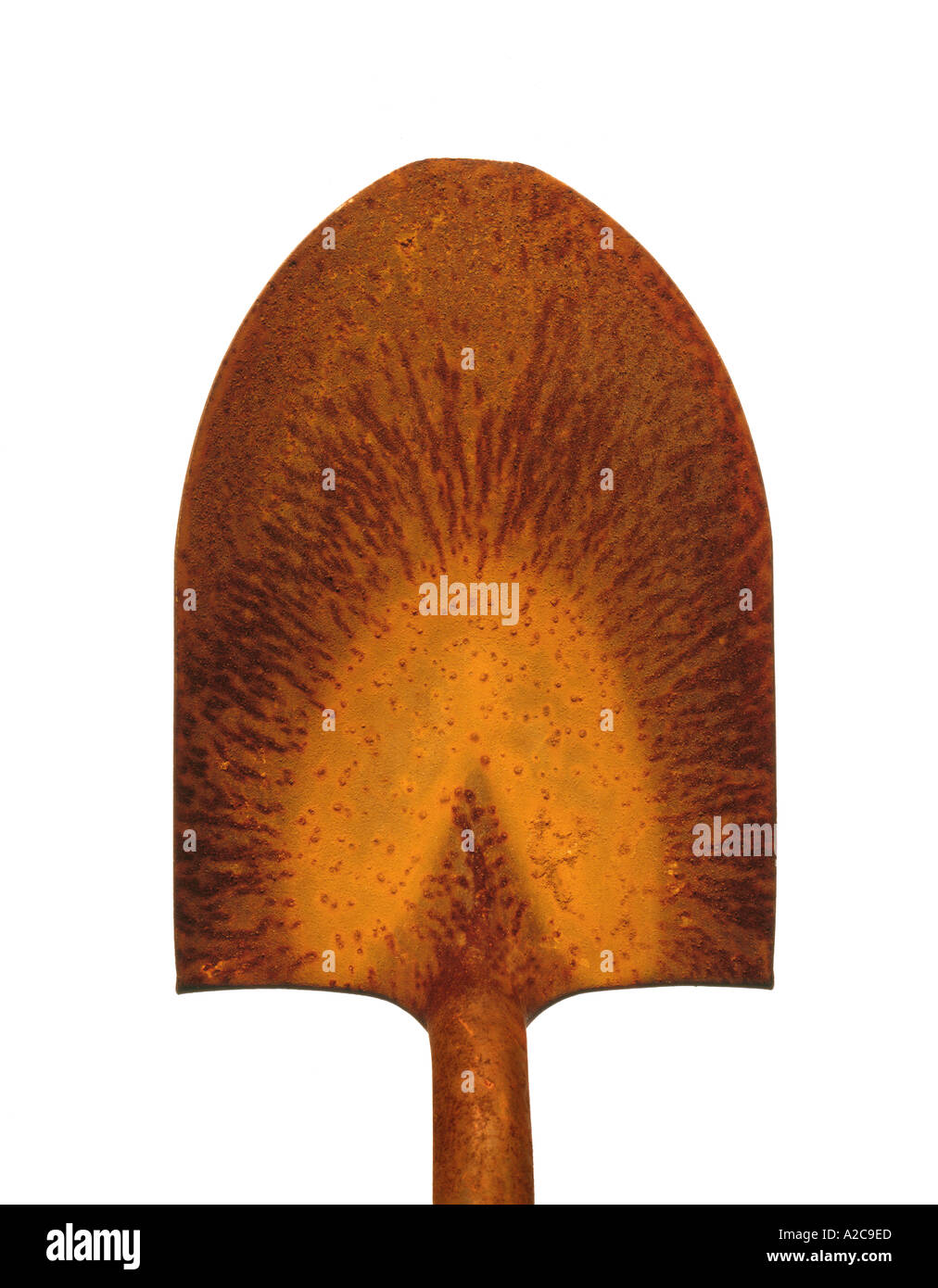 Rusted metal shovel on white with oxidation patterns Stock Photo