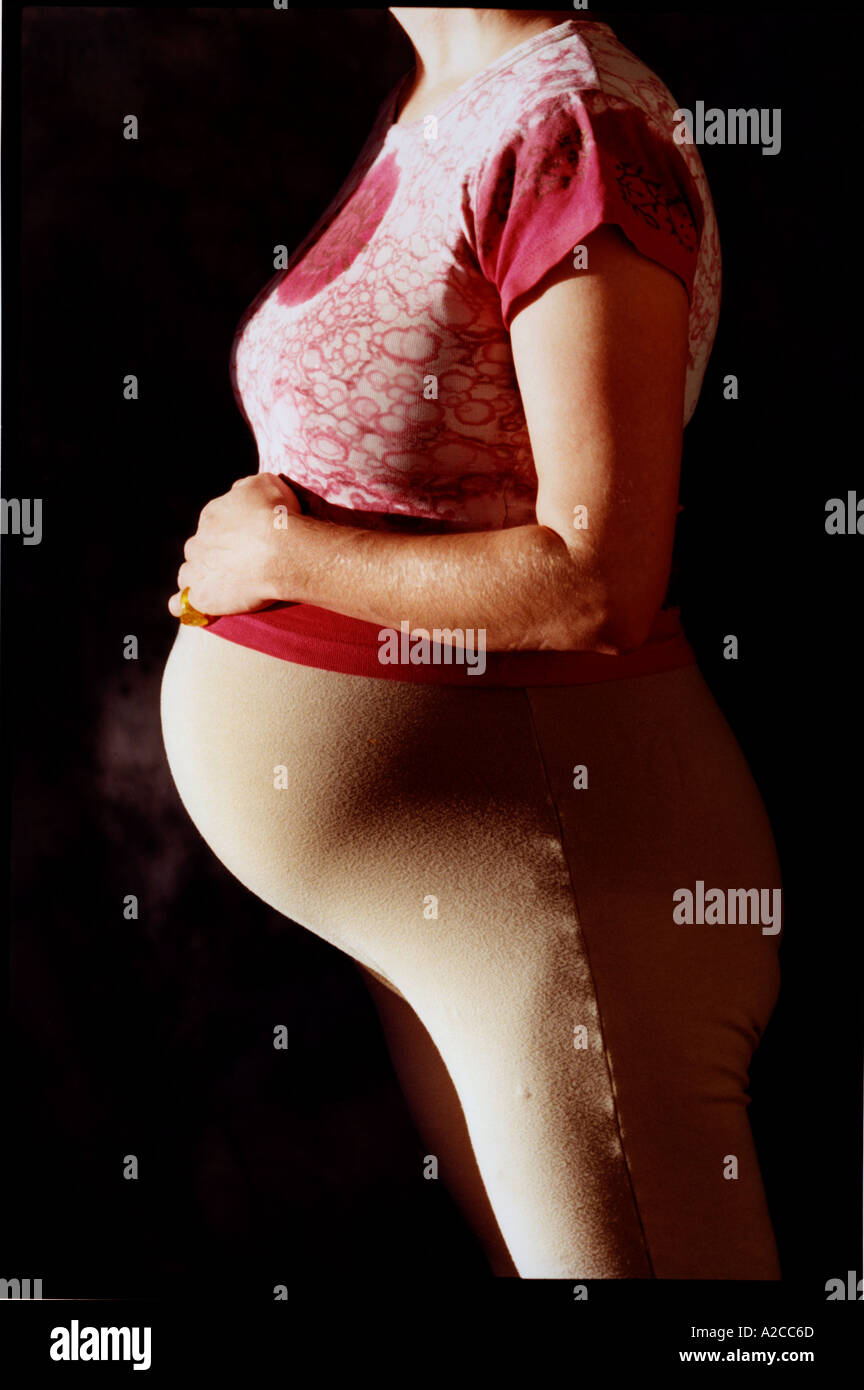 pregnant woman in stockings Stock Photo