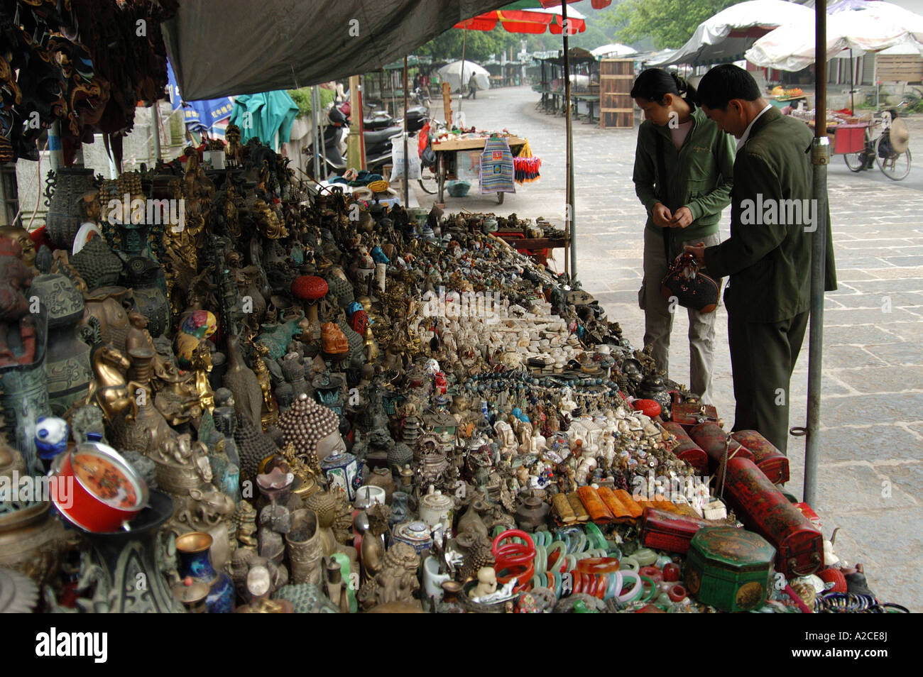 People vewing goods at the market, Yangshuo China Stock Photo Alamy