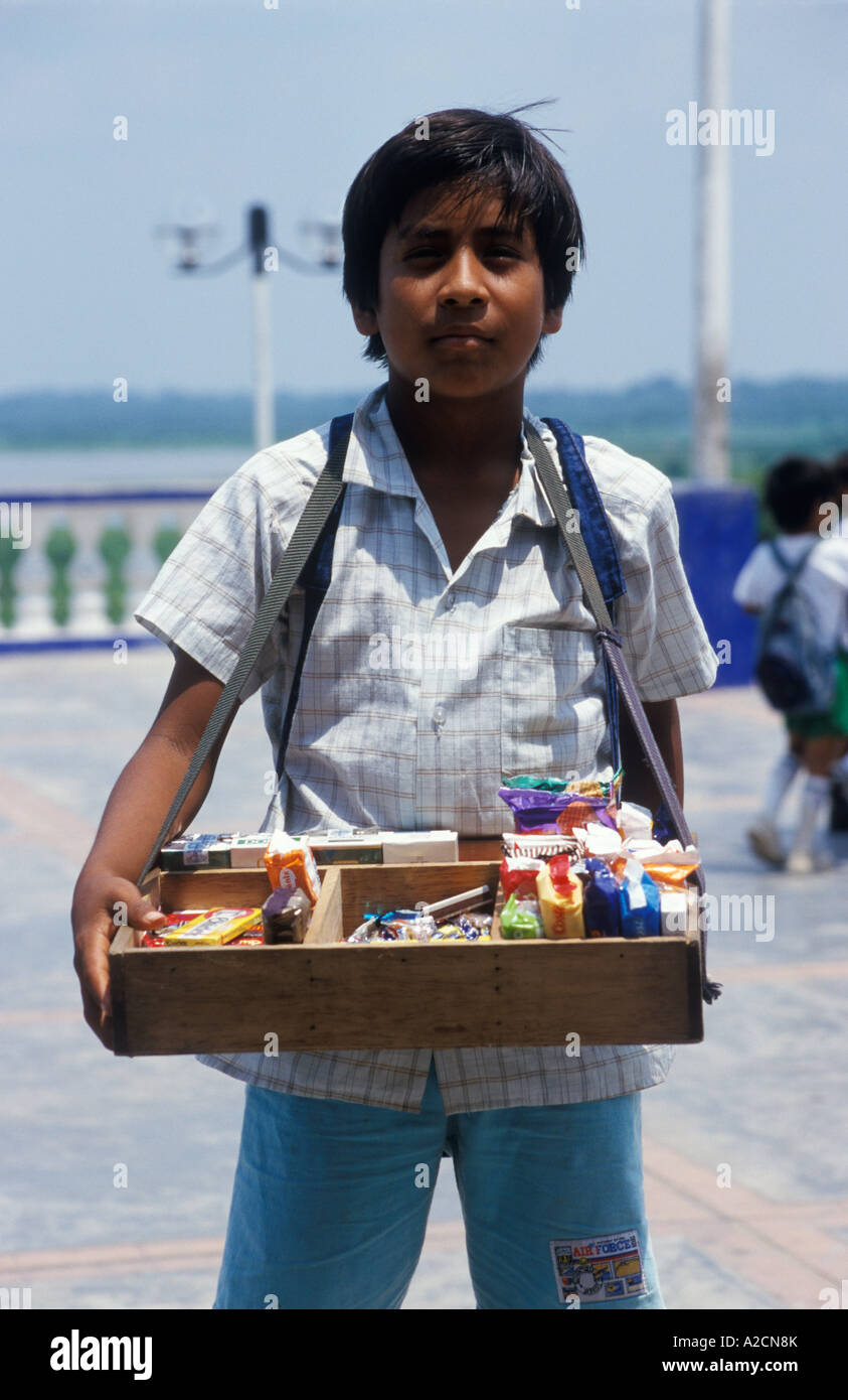 boy with a hawker´s tray in Iquitos in Peru Stock Photo - Alamy