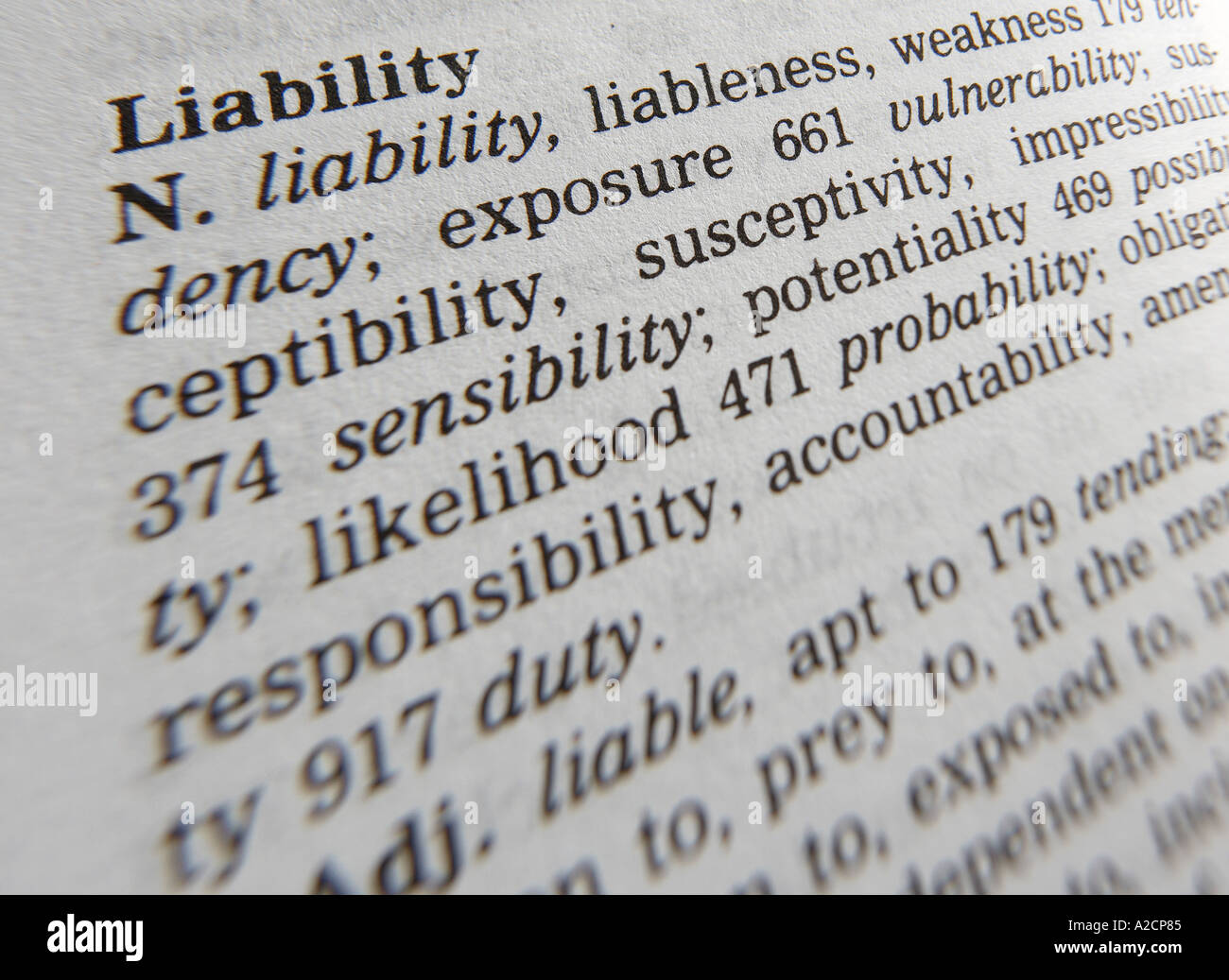 THESAURUS PAGE SHOWING DEFINITION OF WORD LIABILITY Stock Photo