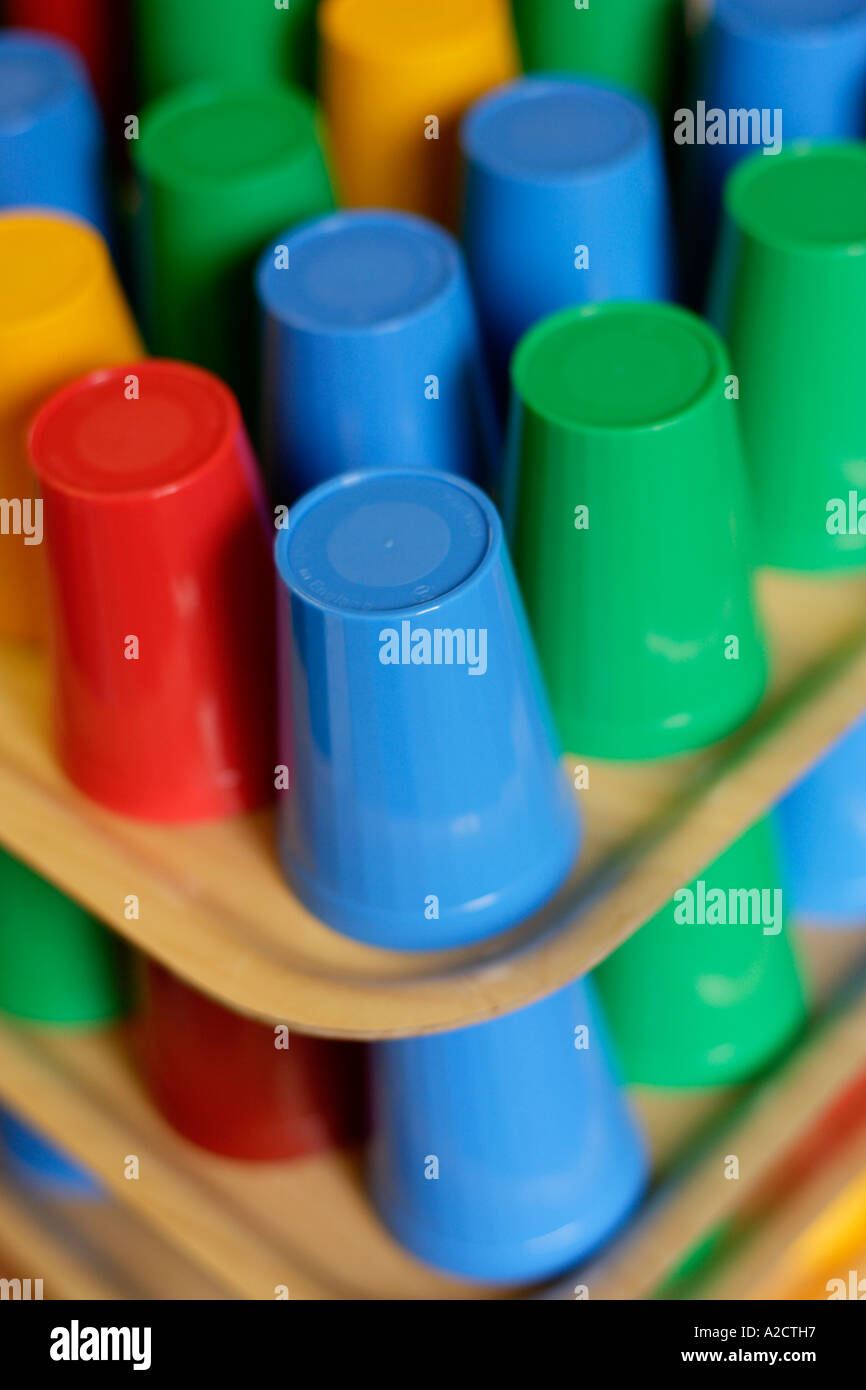 Colourful cups in a school canteen Stock Photo Alamy