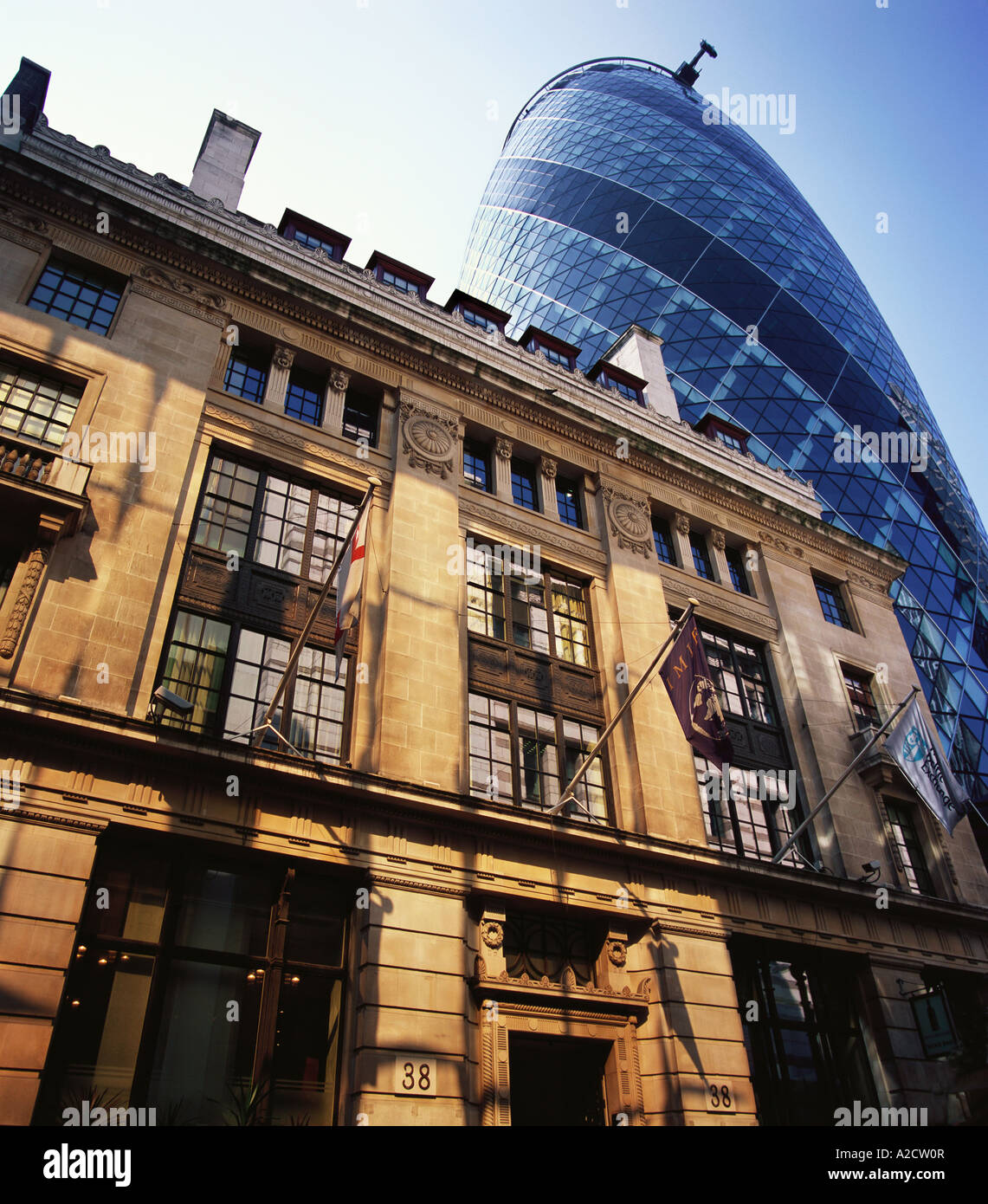Exterior Baltic Exchange Building and Swiss Re building Gherkin St Mary Axe London Stock Photo