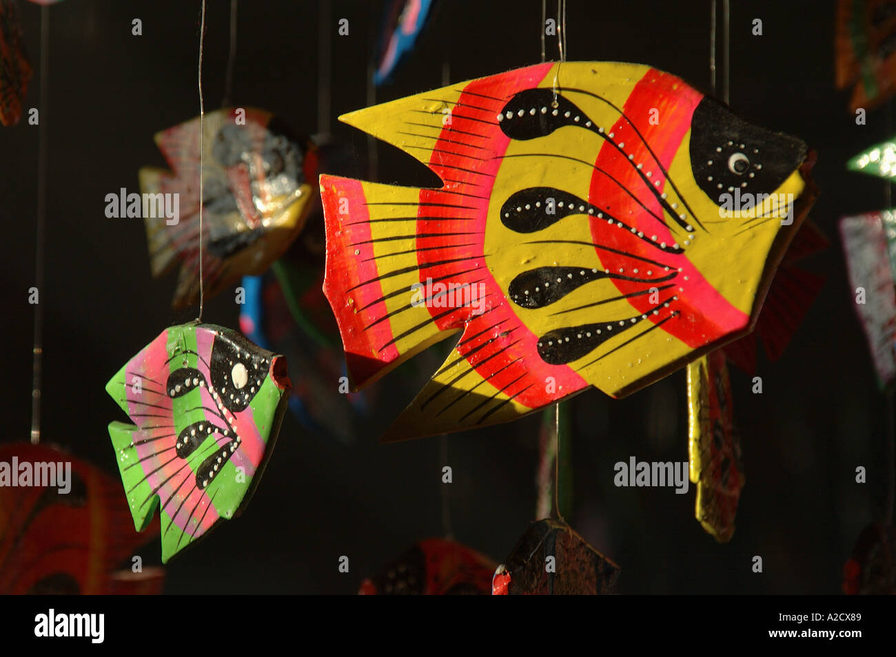 Carved and painted wooden tropical fish mobile from Grand Bahama Island