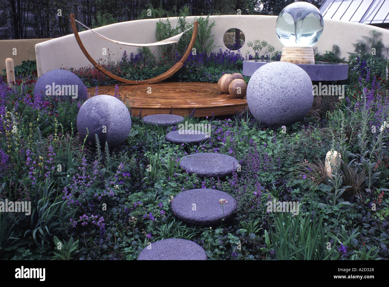 Elavation Garden The garden is based on the theme of an outdoor room that evokes the feeling of elevation and lightness Globe w Stock Photo