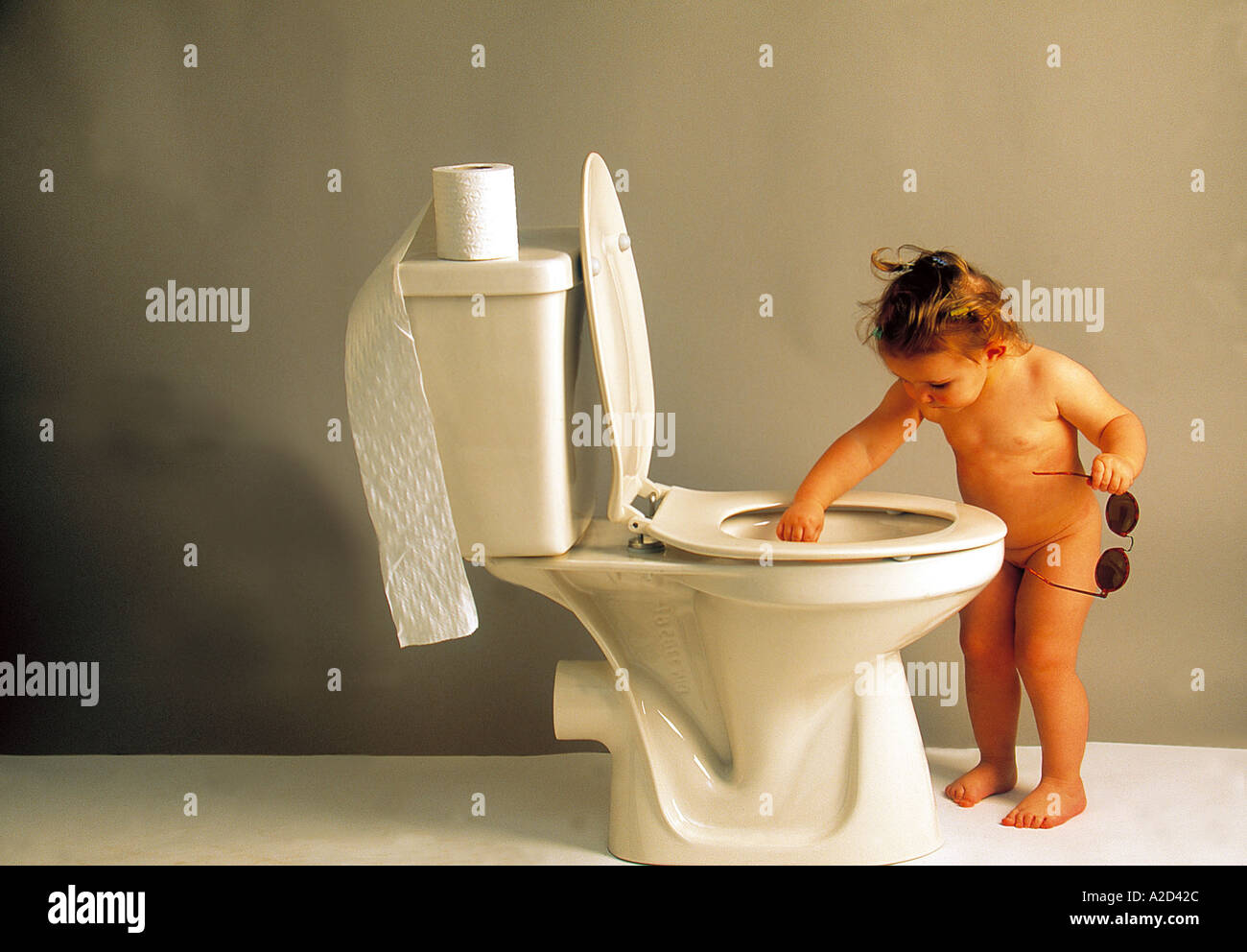 little girl with wc Stock Photo - Alamy