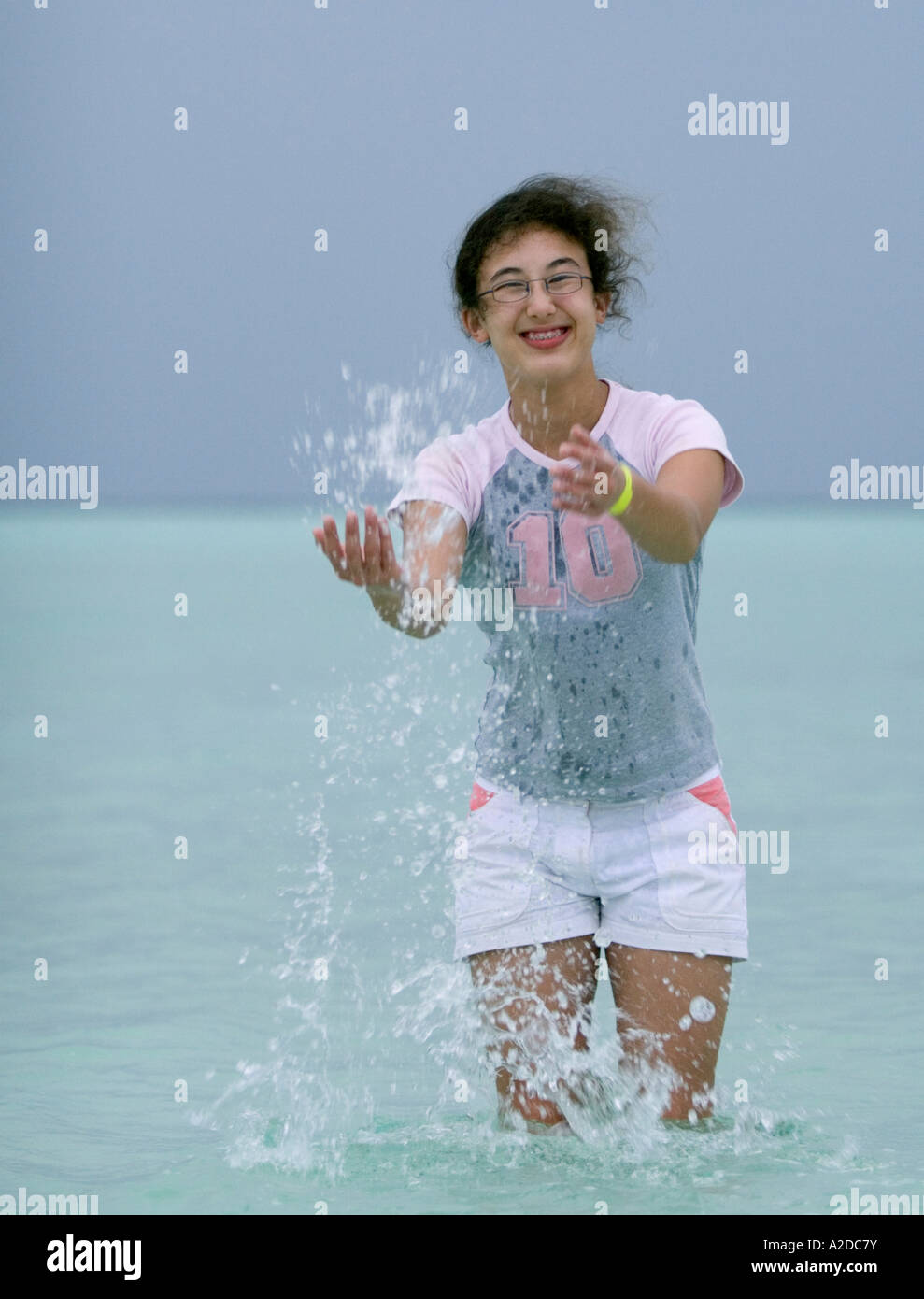 Indian girl splashing water hi-res stock photography and images - Alamy