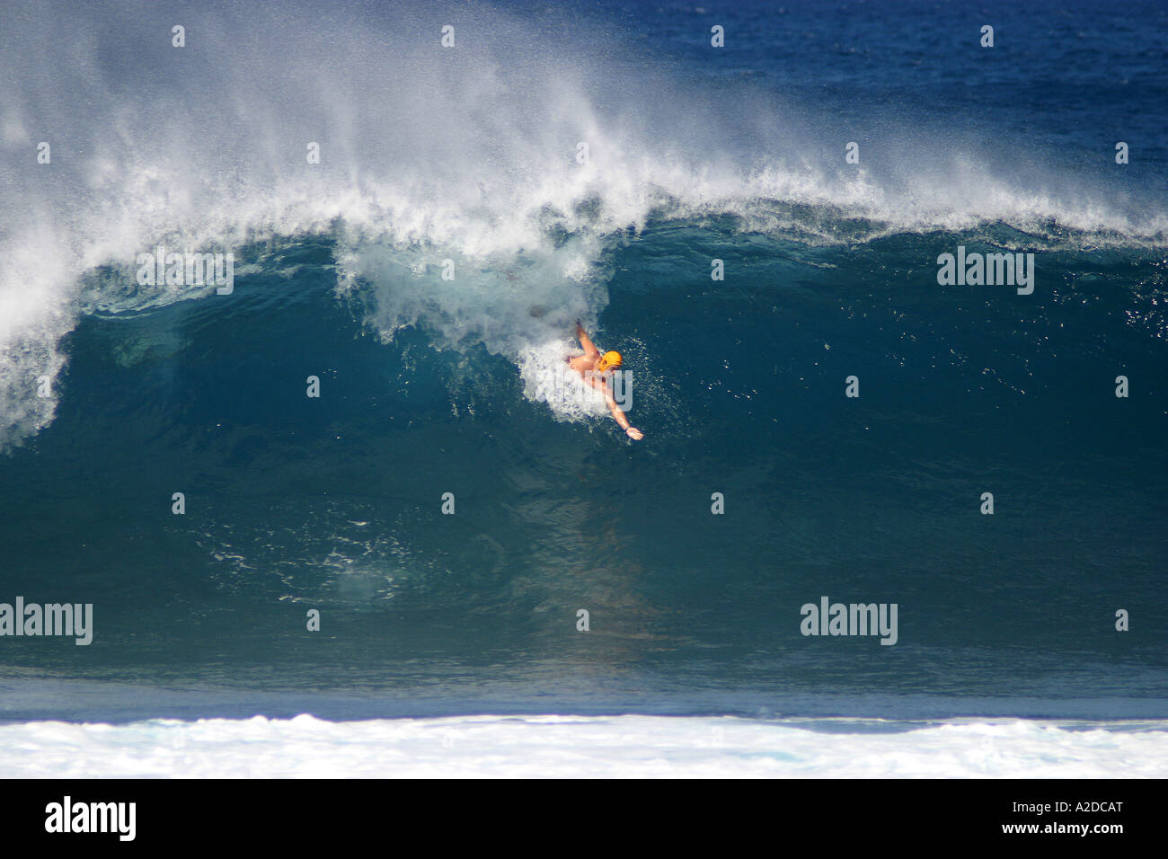 Body surfer competing in The 'Classic' at Pipeline, North Shore, Oahu, Hawaii, USA Stock Photo