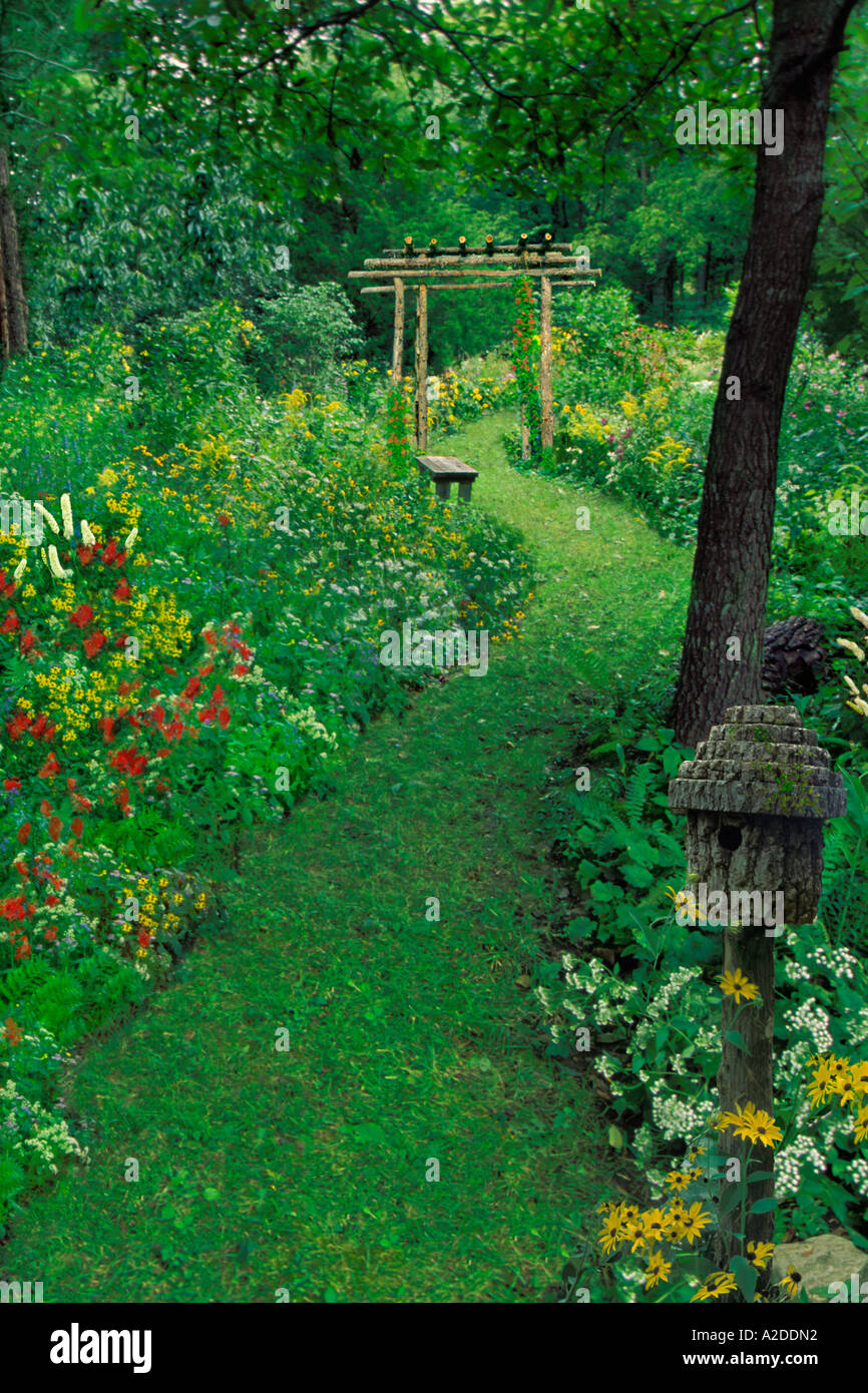 Handmade rustic summer garden path with handmade garden art features