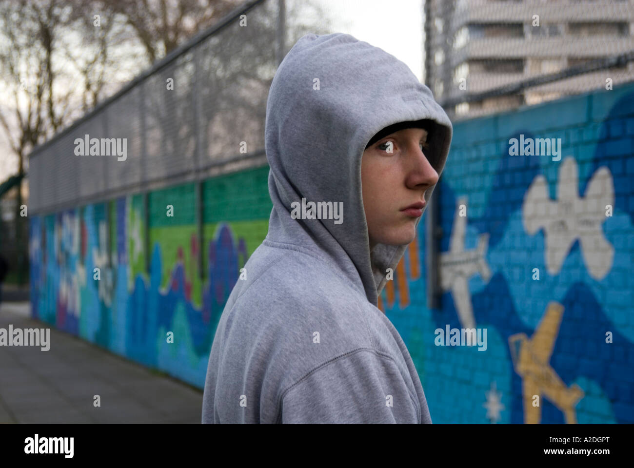 Teenager hanging around in hoodie clothing, London, England, UK Stock Photo