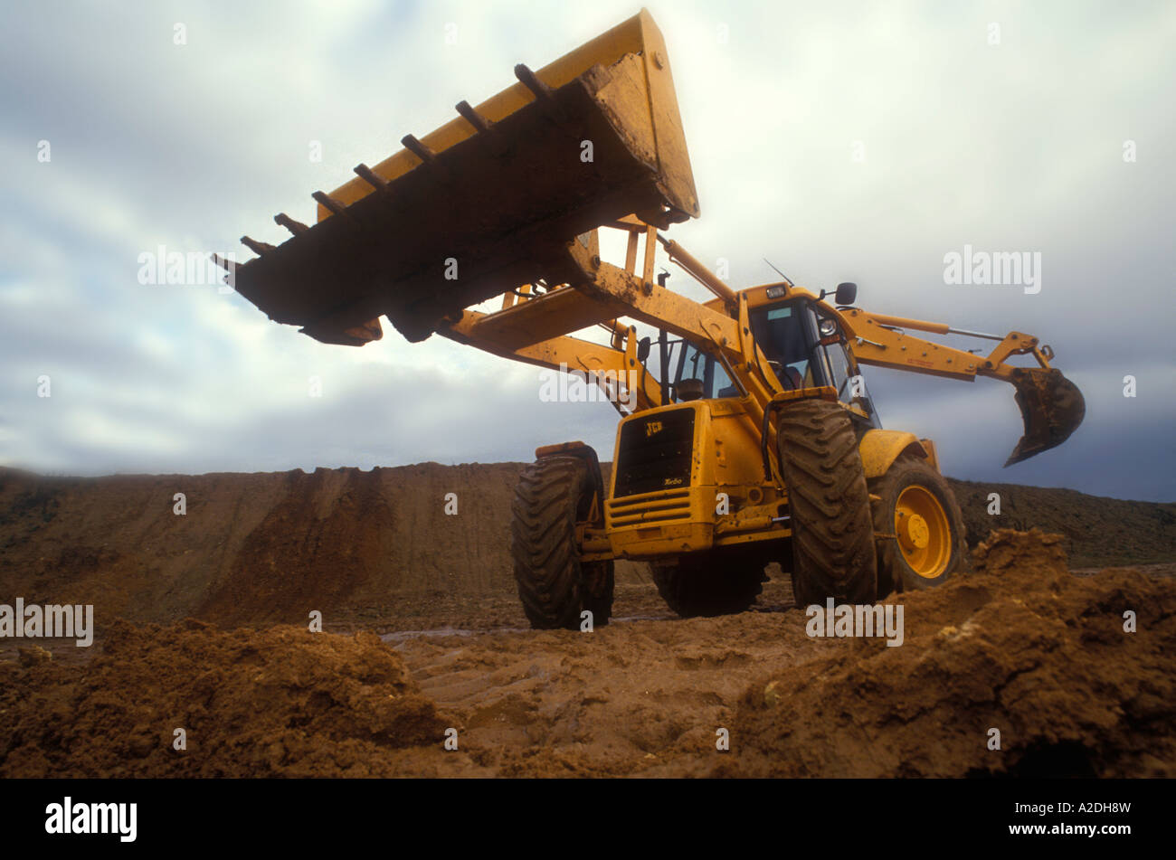 JCB digger working on site Stock Photo
