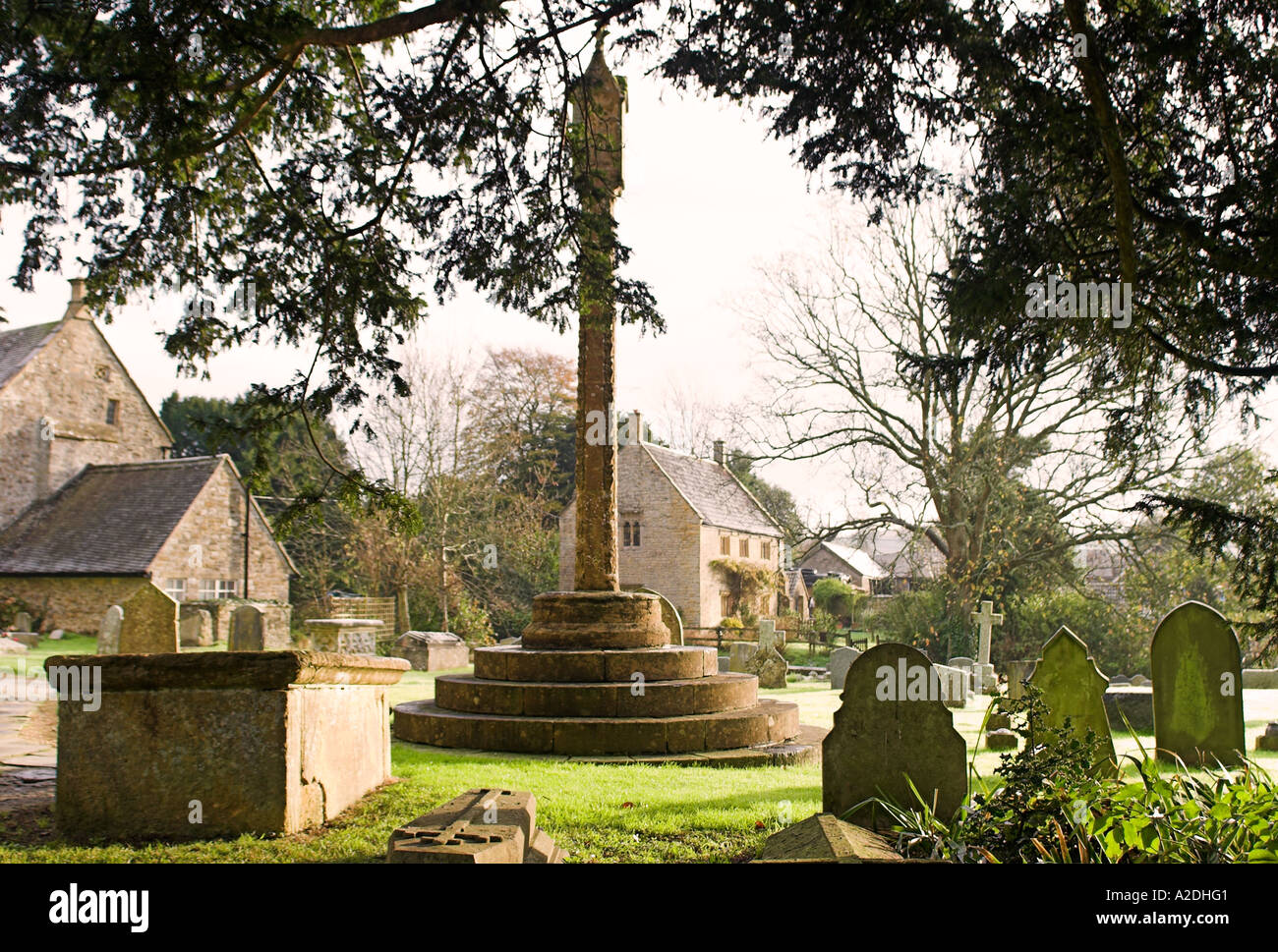 The Churchyard and Cross at St Andrew's Church Trent Dorset Stock Photo
