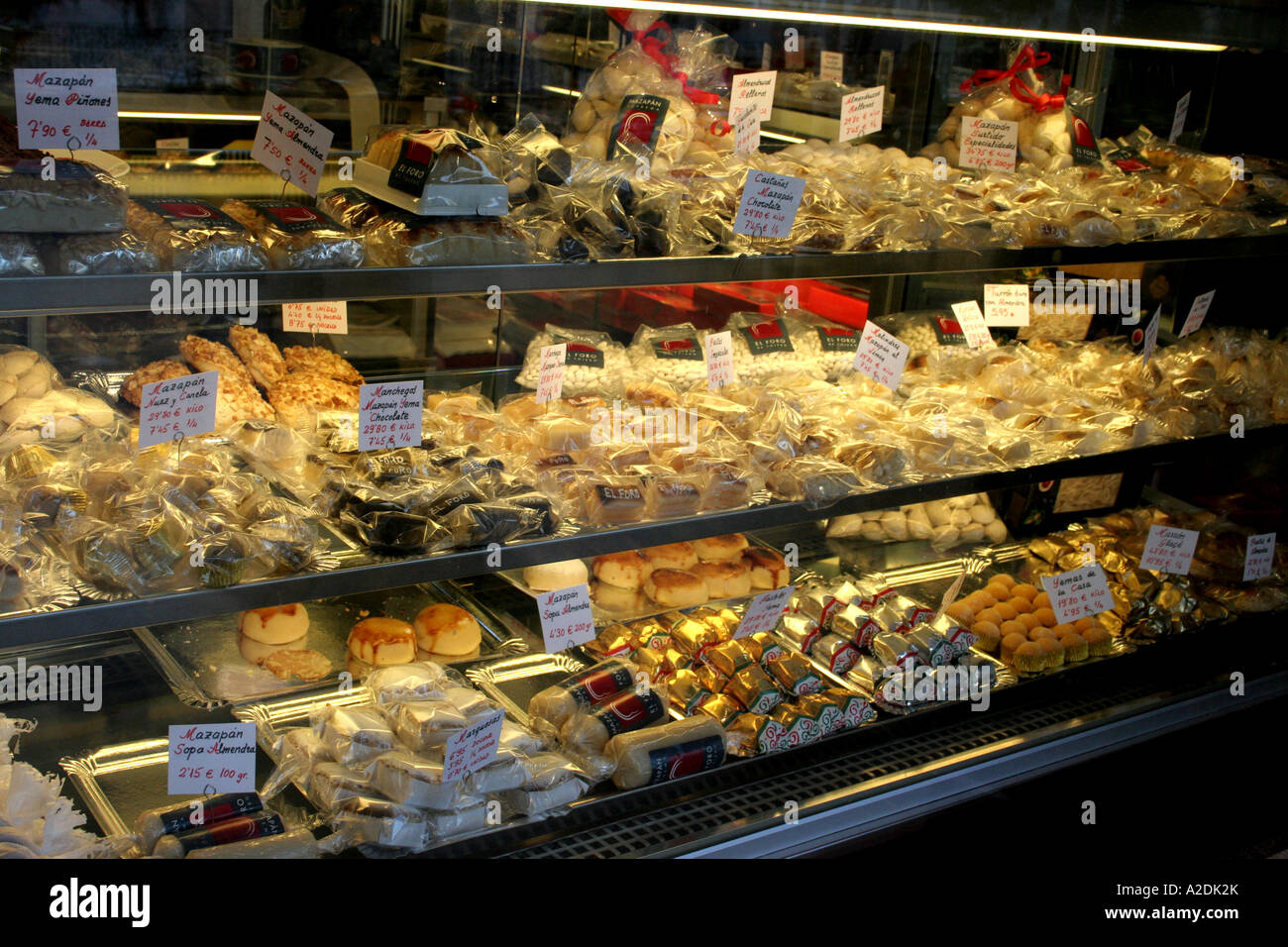 Cakes pastries and chocolates on sale in this cafe in Toledo Spain. Stock Photo