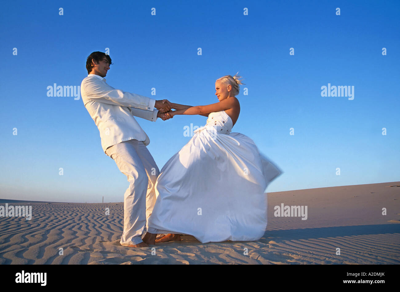 1207840 outdoor summer day beach couple woman man young 25 30 blonde ...