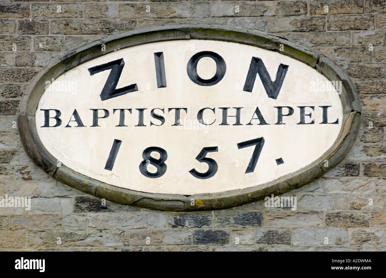 Name plaque on exterior of Zion Baptist Chapel Llanelli Carmarthenshire Wales UK GB dated 1857 Stock Photo