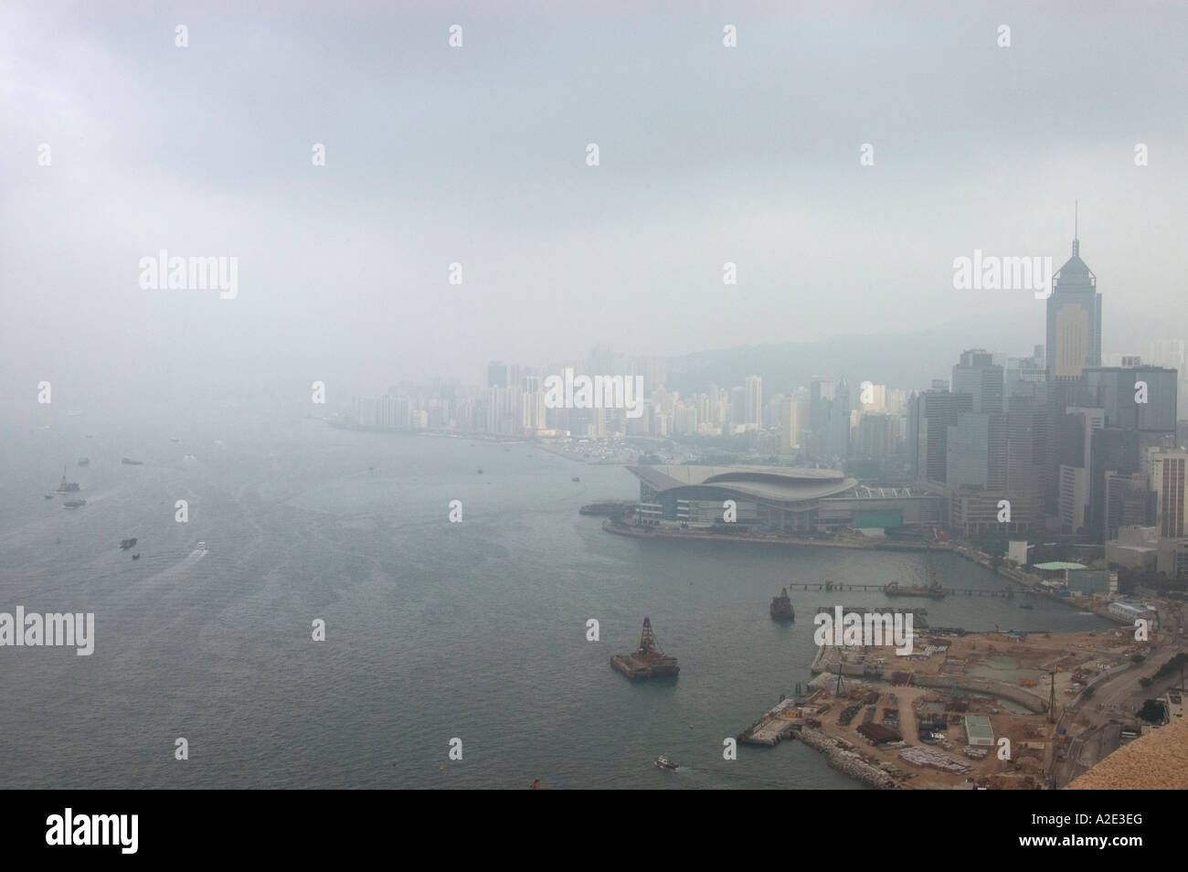 Hong Kong Harbour showing pollution and land reclamation Stock Photo