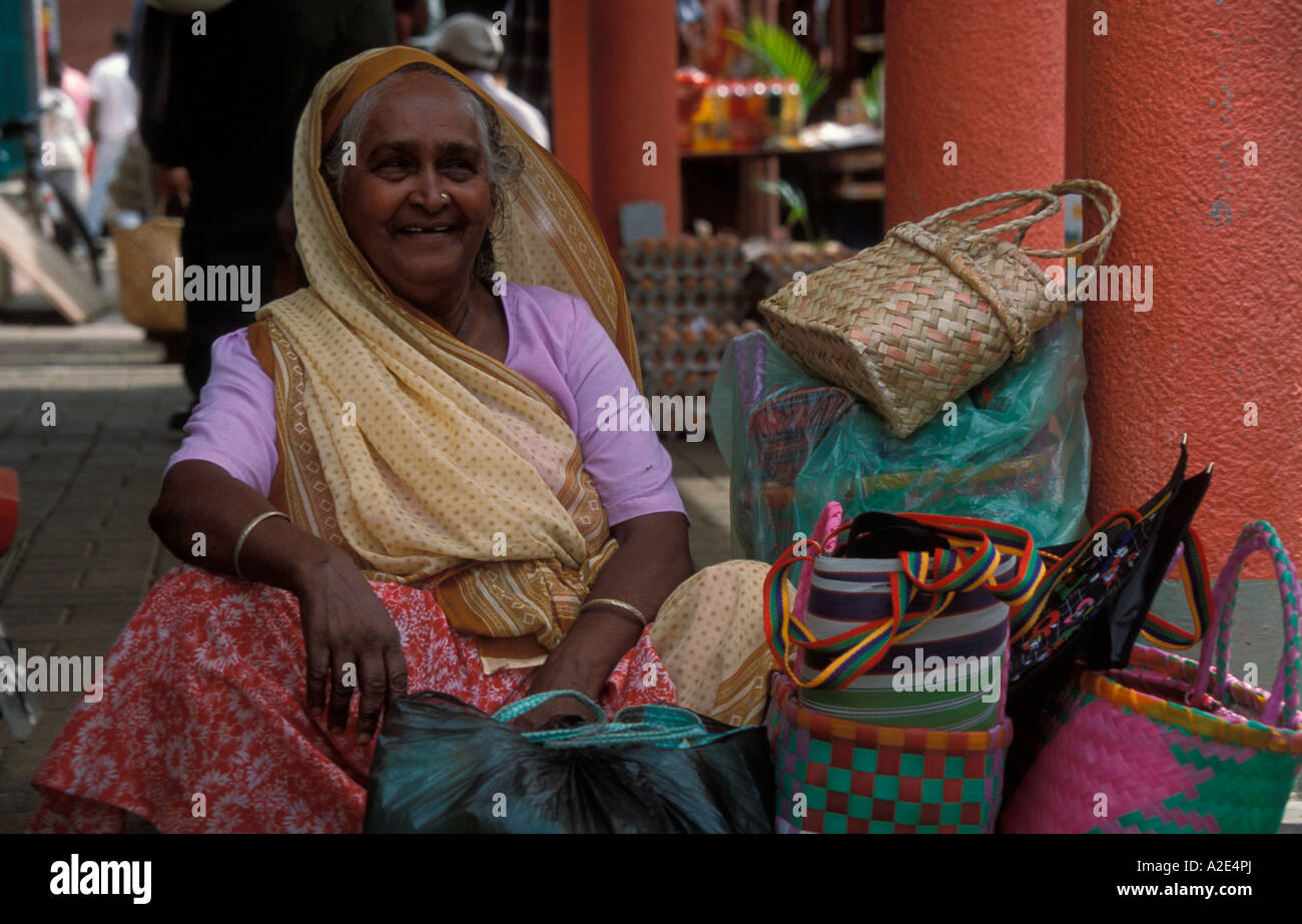 Woman Selling handmade baskets Mauritius Stock Photo