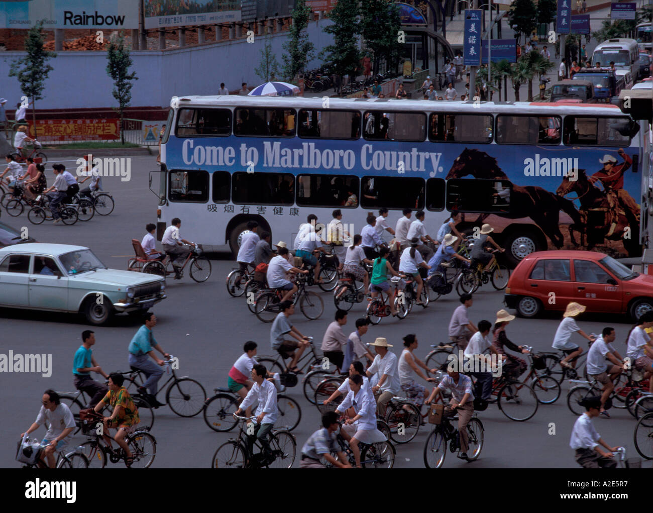 East meets West: American cigarette ad's, highly visible to Chinese commuters. Stock Photo