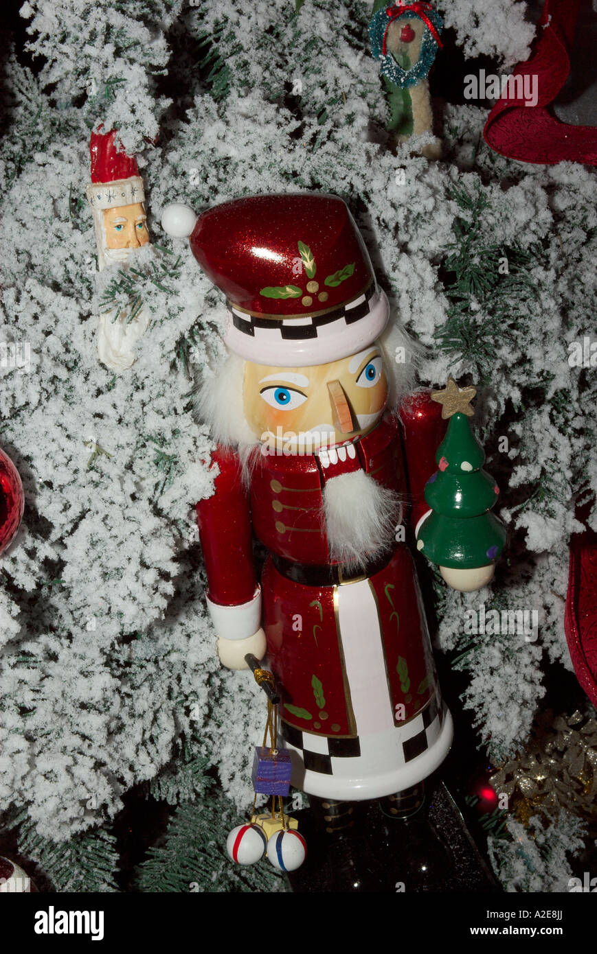 A nutcracker tree ornament on a flocked Christmas tree that will be auctioned off at the