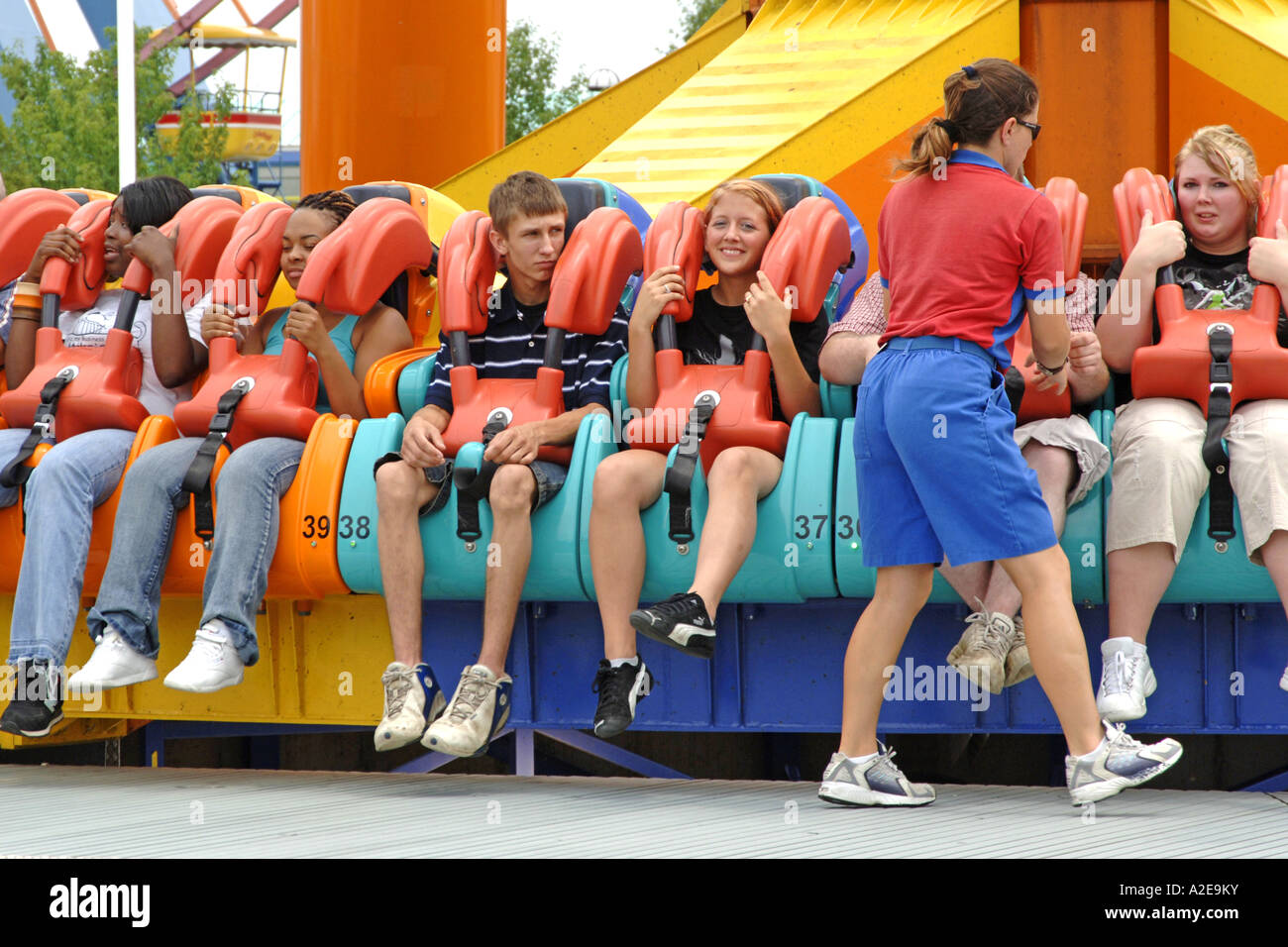 People strapping into a ride at Cedar Point Amusement Park, Sandusky OH ...