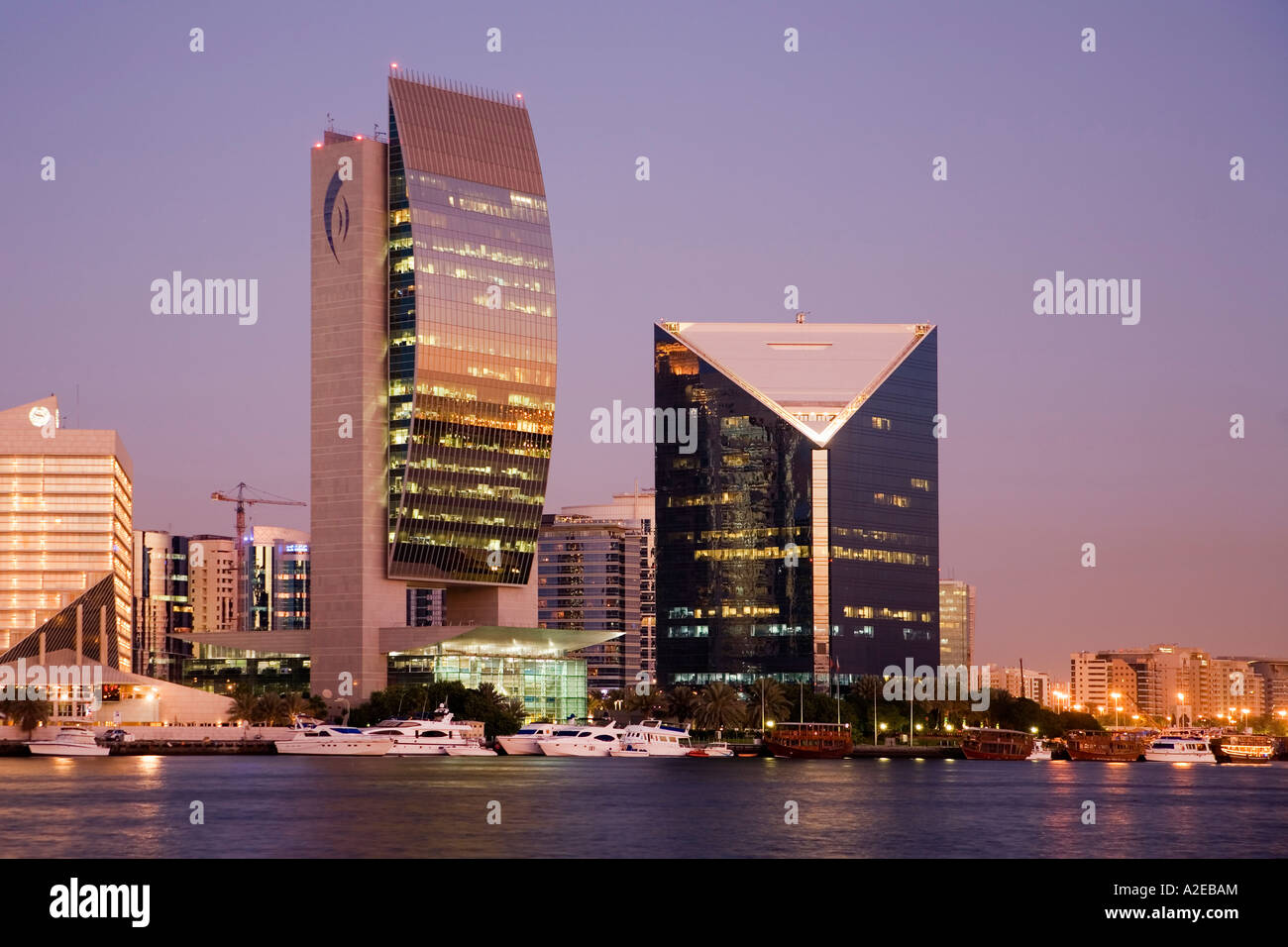 Dubai Creek Promenade Skyline modern architecture Dubai national bank sunset Stock Photo