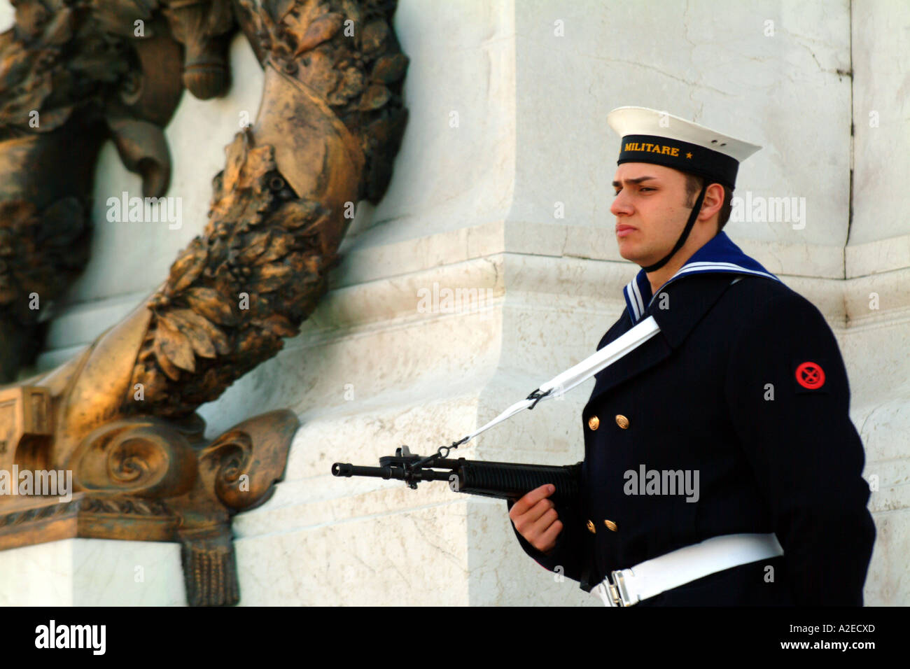 miltary on guard duty sailor navy naval uniformed men male weapon rifle gun armed Stock Photo