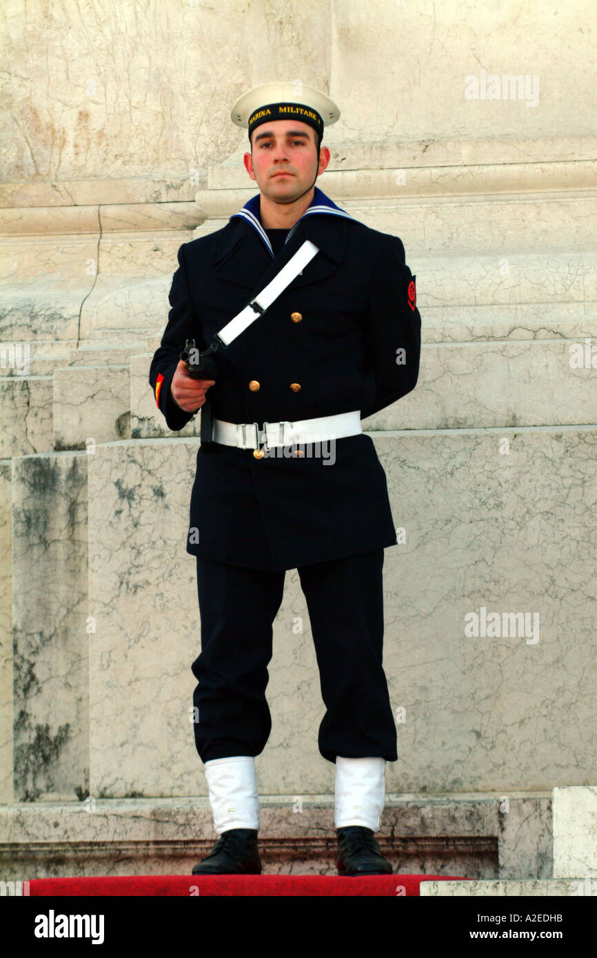 miltary on guard duty sailor navy naval uniformed men male weapon rifle gun armed stand still standing Stock Photo